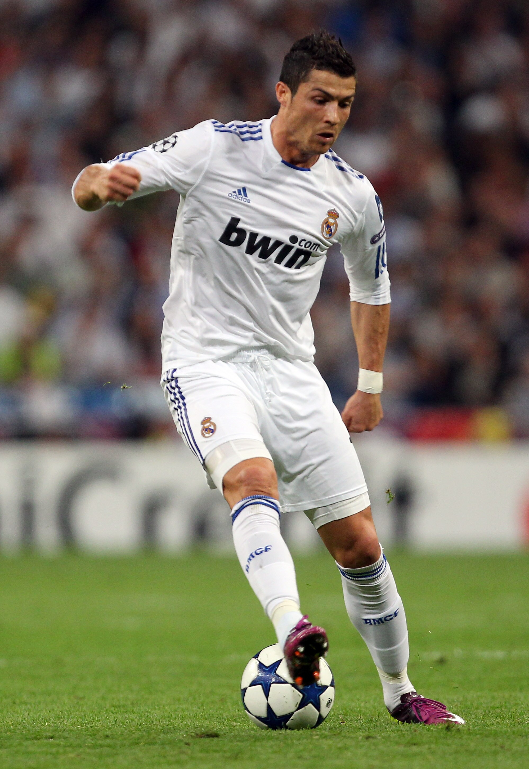 MADRID, SPAIN - APRIL 05:  Cristiano Ronaldo of Real Madrid during the UEFA Champions League Quarter Final first leg match between Real Madrid and Tottenham Hotspur at Estadio Santiago Bernabeu on April 5, 2011 in Madrid, Spain.  (Photo by Clive Rose/Gett