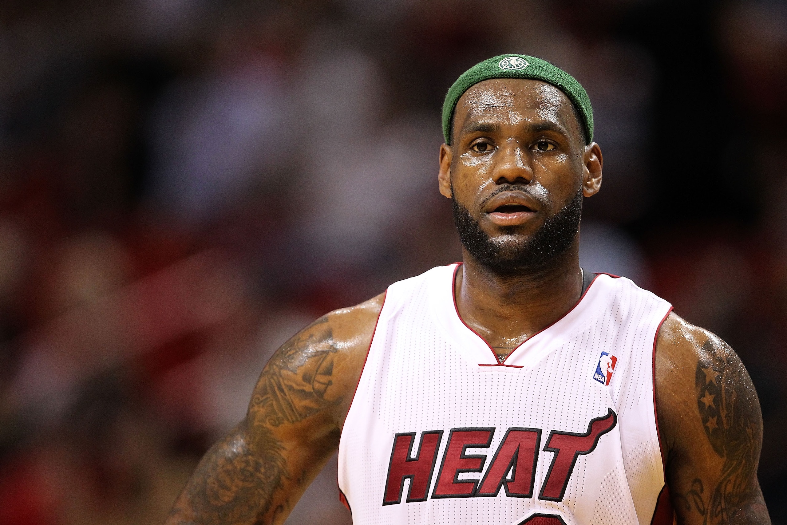 MIAMI, FL - APRIL 06: Lebron James #6 of the Miami Heat looks on during a game against the Milwaukee Bucks at American Airlines Arena on April 6, 2011 in Miami, Florida. NOTE TO USER: User expressly acknowledges and agrees that, by downloading and/or usin MIAMI, FL - APRIL 06: Lebron James #6 of the Miami Heat looks on during a game against the Milwaukee Bucks at American Airlines Arena on April 6, 2011 in Miami, Florida. NOTE TO USER: User expressly acknowledges and agrees that, by downloading and/or usin