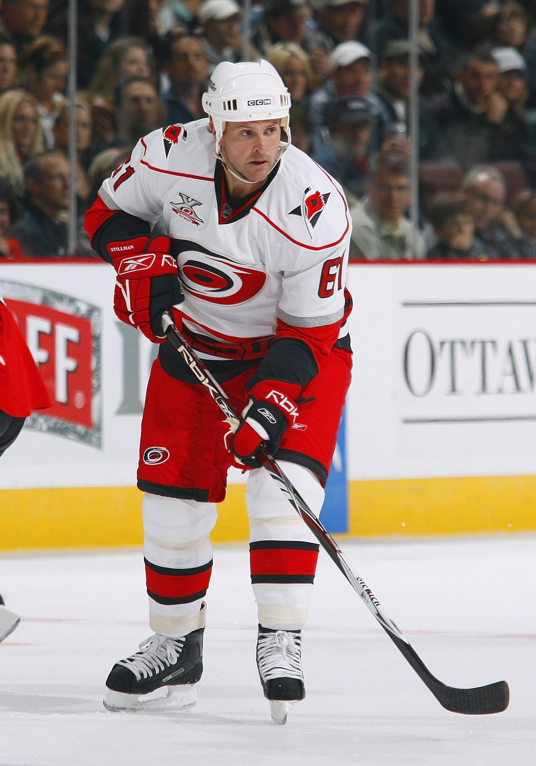 TORONTO - OCTOBER 11:  Cory Stillman #61 of the Carolina Hurricanes skates during the NHL game against the Ottawa Senators at the Scotiabank Place on October 11, 2007 in Ottawa, Canada. (Photo by Phillip MacCallum/Getty Images)