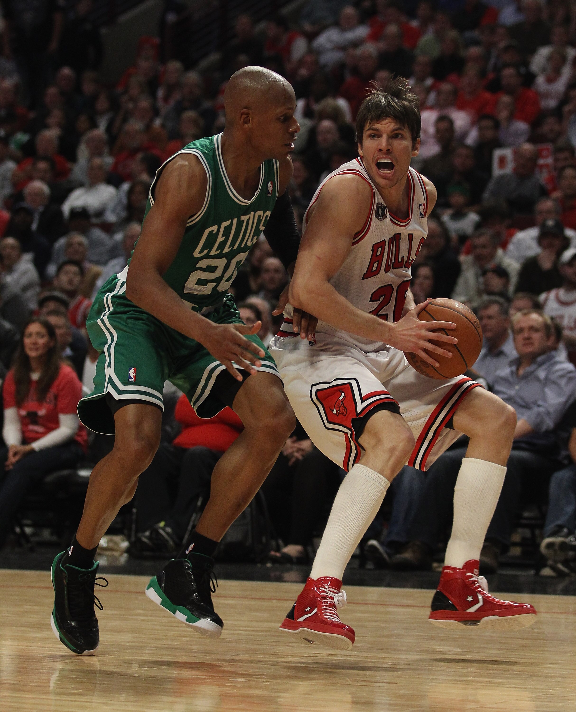 CHICAGO, IL - APRIL 07: Kyle Korver #26 of the Chicago Bulls drives against Ray Allen #20 of the Boston Celtics at United Center on April 7, 2011 in Chicago, Illinois. The Bulls defeated the Celtics 97-81. NOTE TO USER: User expressly acknowledges and agr