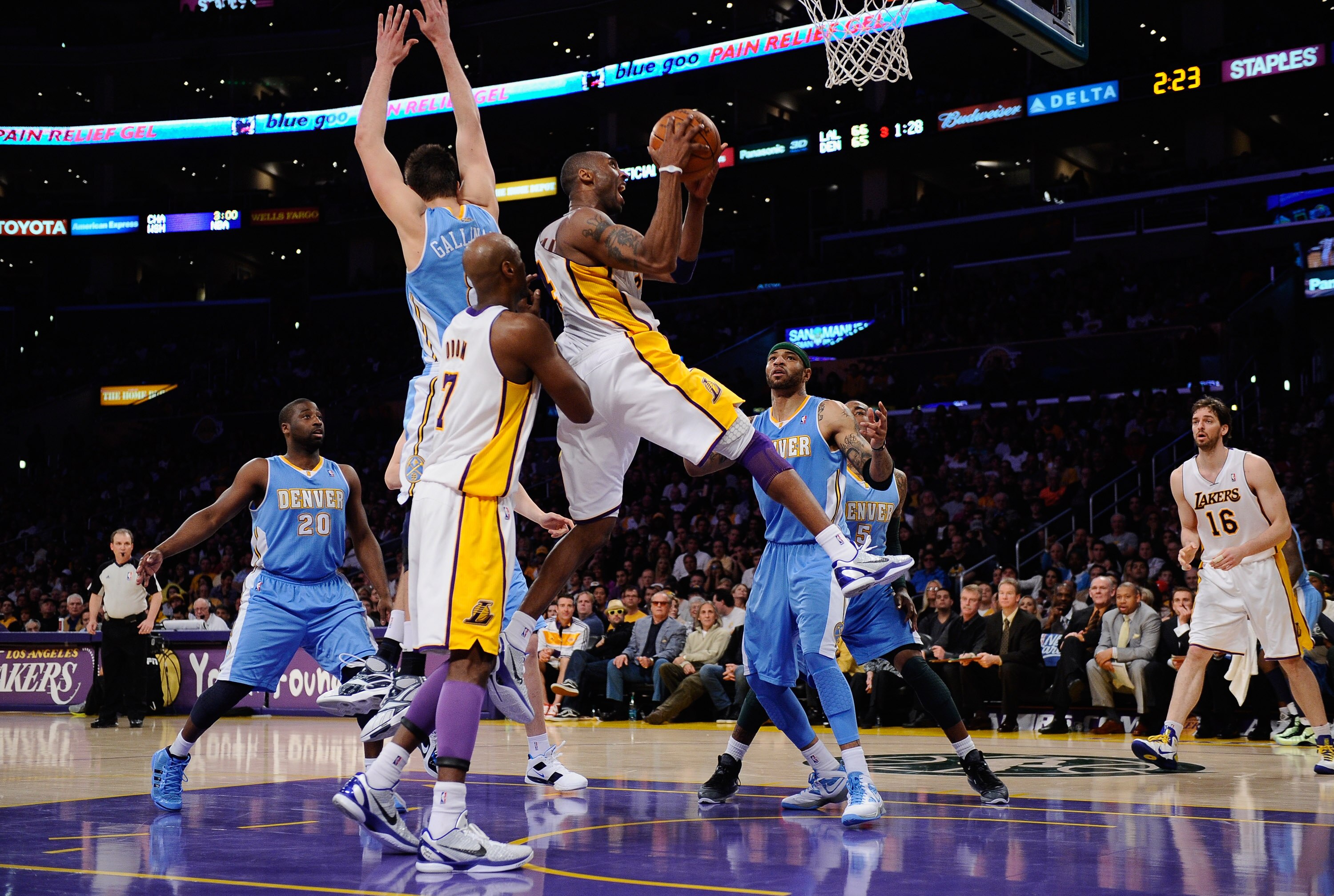 LOS ANGELES, CA - APRIL 03:  Kobe Bryant #24 of the Los Angeles Lakers drives to the basket against the Denver Nuggets during the NBA basketball game at Staples Center on April 3, 2011 in Los Angeles, California. NOTE TO USER: User expressly acknowledges