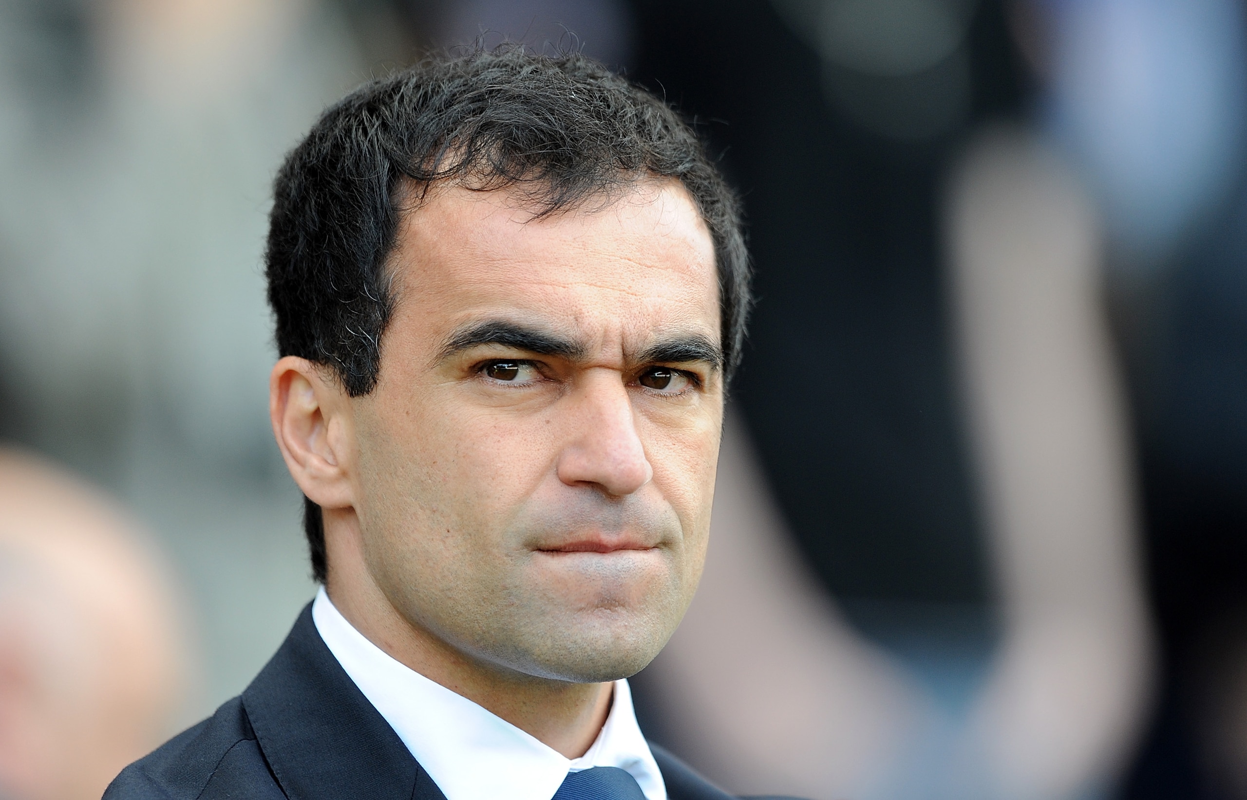 WIGAN, ENGLAND - APRIL 02: Wigan Athletic manager Roberto Martinez looks on during the Barclays Premier League match between Wigan Athletic and Tottenham Hotspur at DW Stadium on April 2, 2011 in Wigan, England.  (Photo by Chris Brunskill/Getty Images)