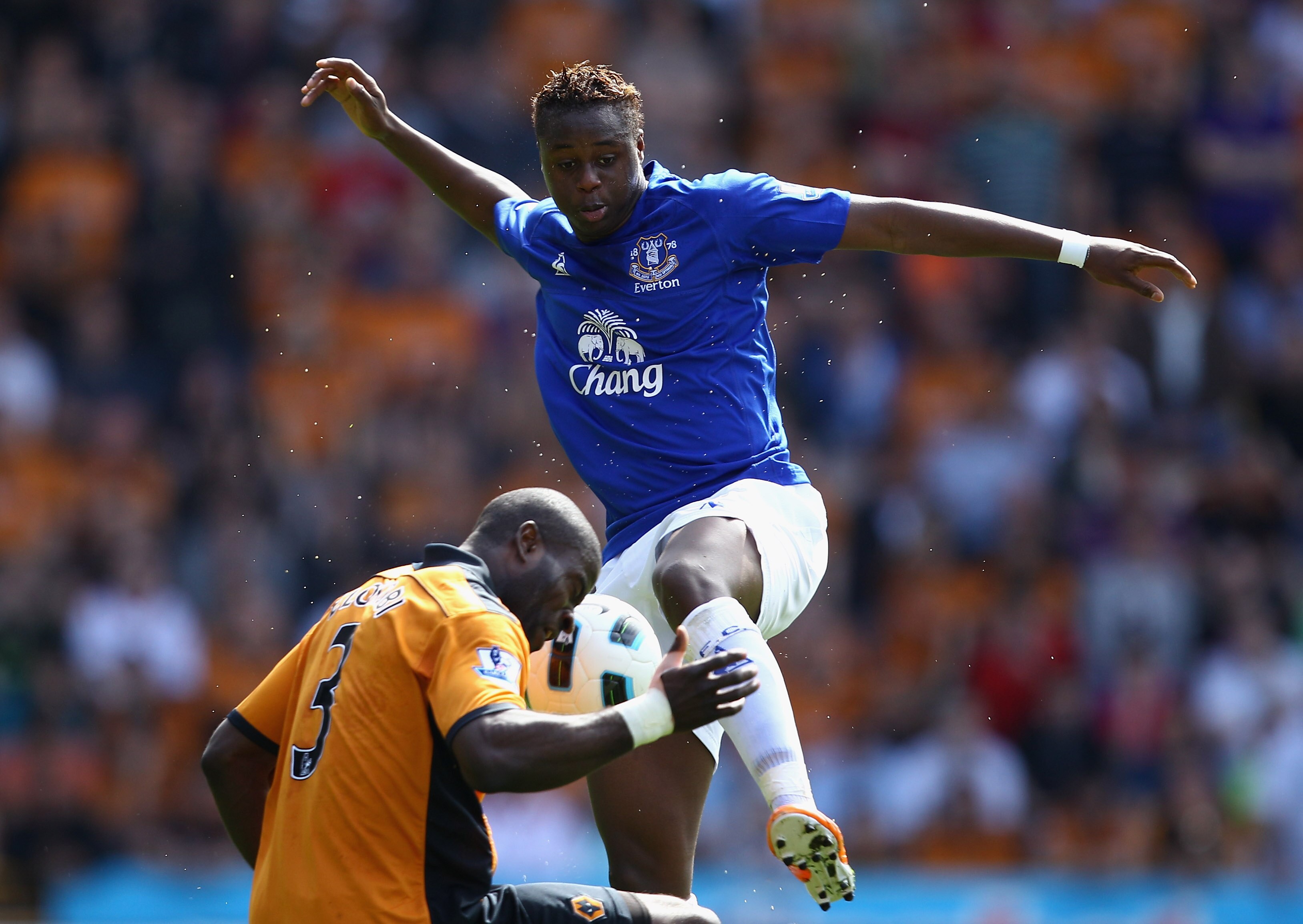 WOLVERHAMPTON, ENGLAND - APRIL 09:  Magaye Gueye of Everton challenges George Elokobi of Wolves during the Barclays Premier League match between Wolverhampton Wanderers and Everton at Molineux on April 9, 2011 in Wolverhampton, England.  (Photo by Richard