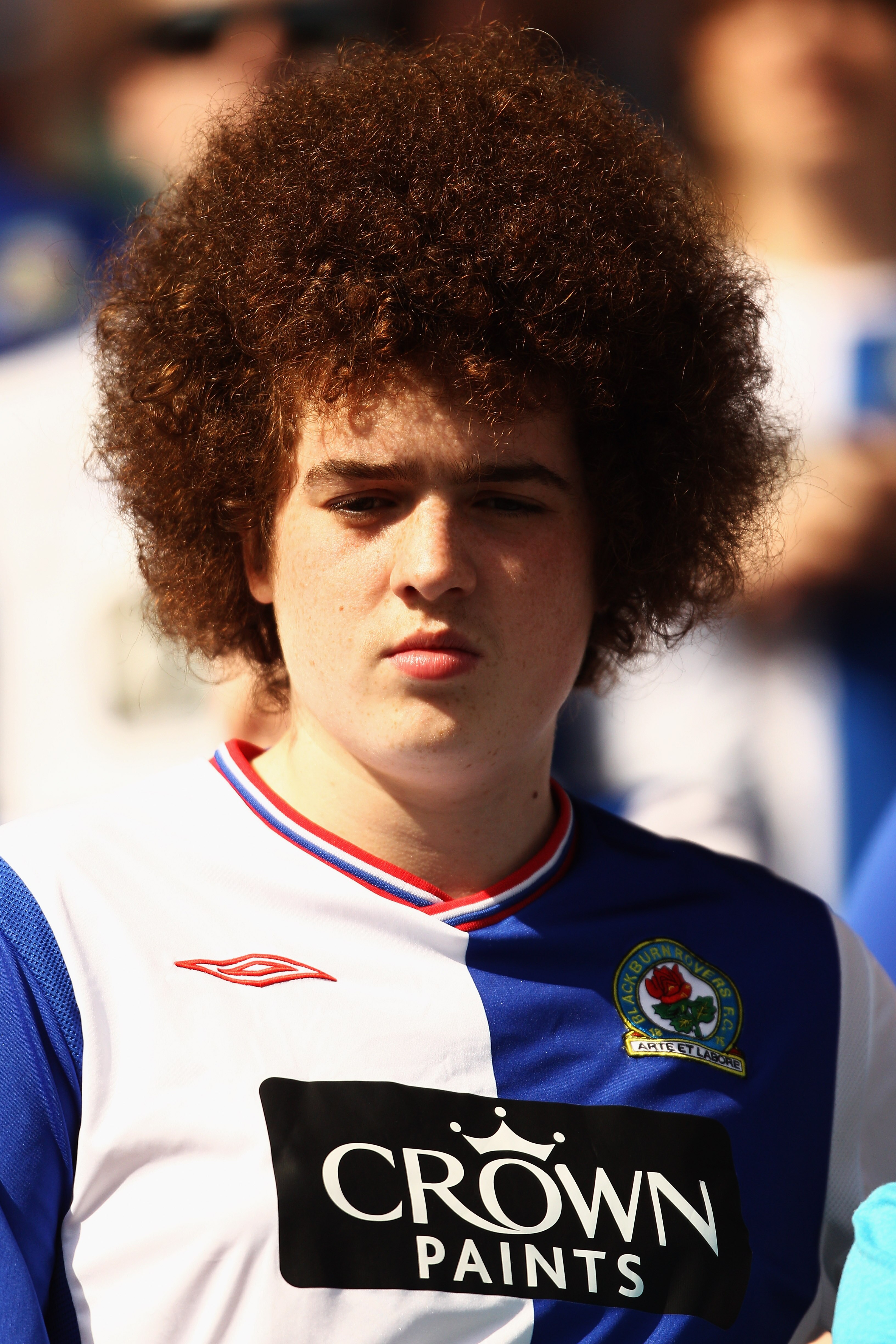 BLACKBURN, ENGLAND - APRIL 09:  A Blackburn fan looks on during the Barclays Premier League match between Blackburn Rovers and Birmingham City at Ewood park on April 9, 2011 in Blackburn, England.  (Photo by Dean Mouhtaropoulos/Getty Images)