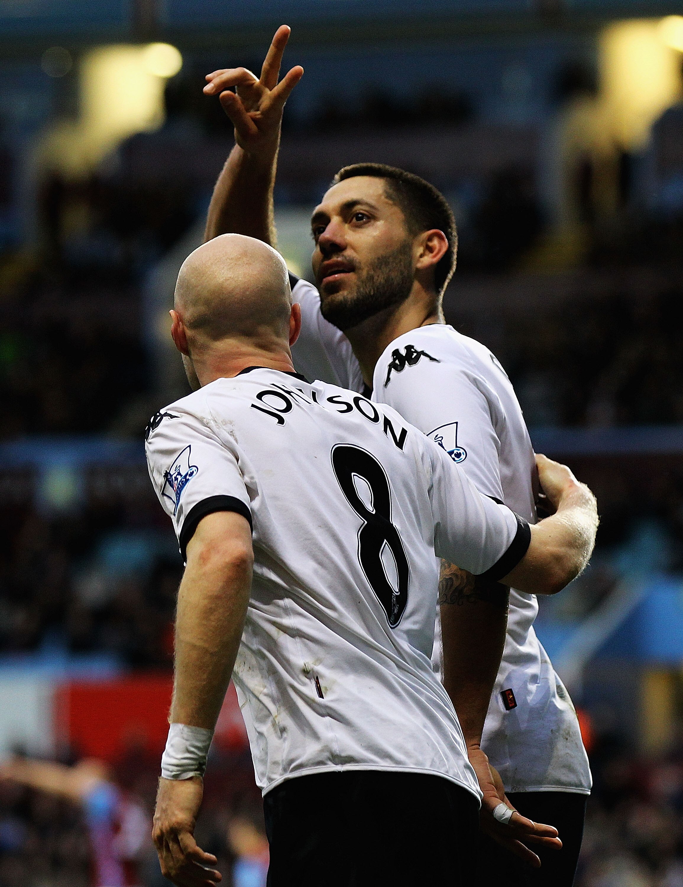 BIRMINGHAM, ENGLAND - FEBRUARY 05:  Clint Dempsey of Fulham celebrates his goal with Andy Johnson during the Barclays Premier League match between Aston Villa and Fulham at Villa Park on February 5, 2011 in Birmingham, England.  (Photo by Matthew Lewis/Ge
