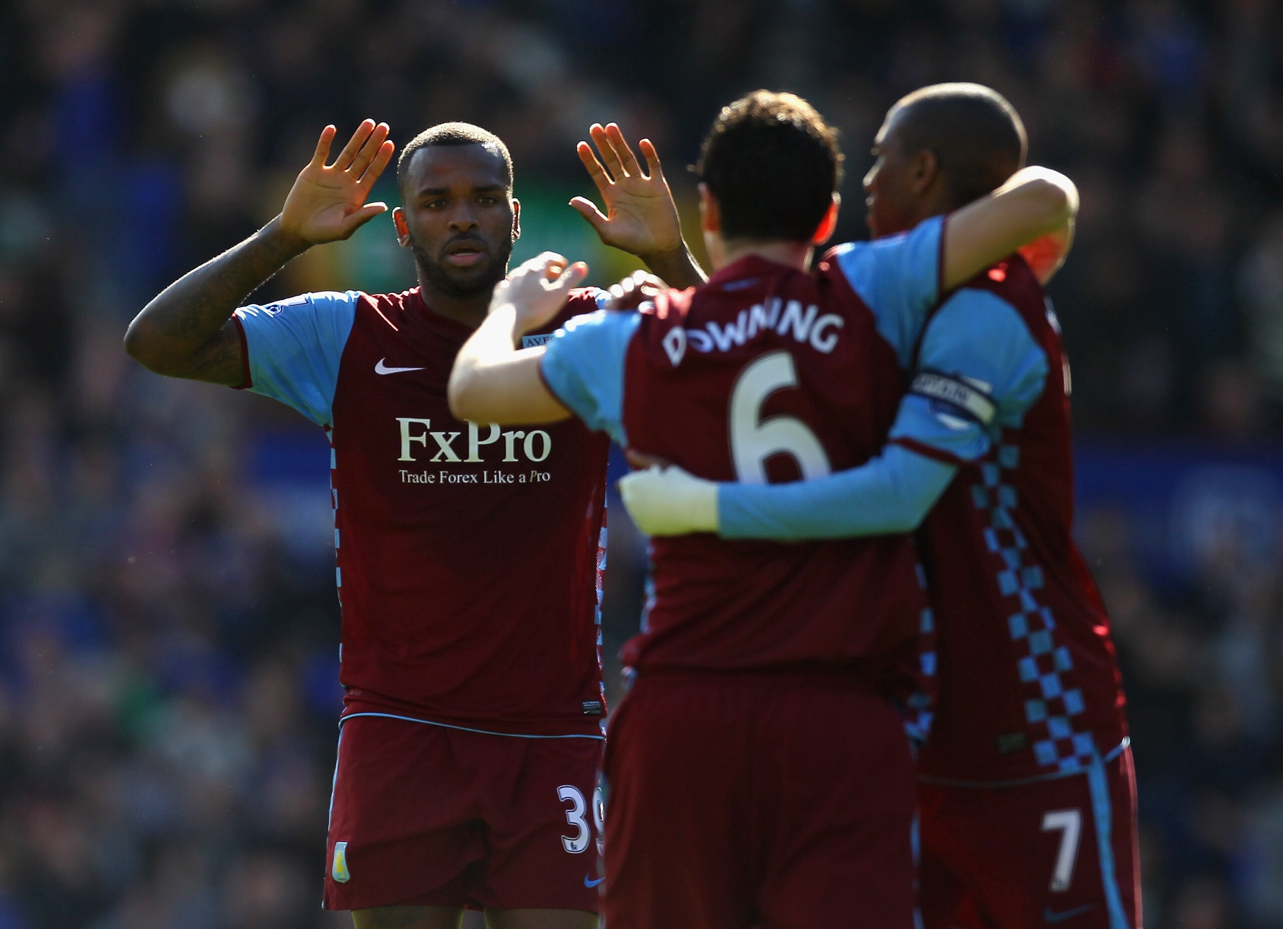 LIVERPOOL, ENGLAND - APRIL 02:  Darren Bent of Aston Villa celebrates with Stewart Downing and Ashley Young after scoring his first goal during the Barclays Premier League match between Everton and Aston Villa at Goodison Park on April 2, 2011 in Liverpoo