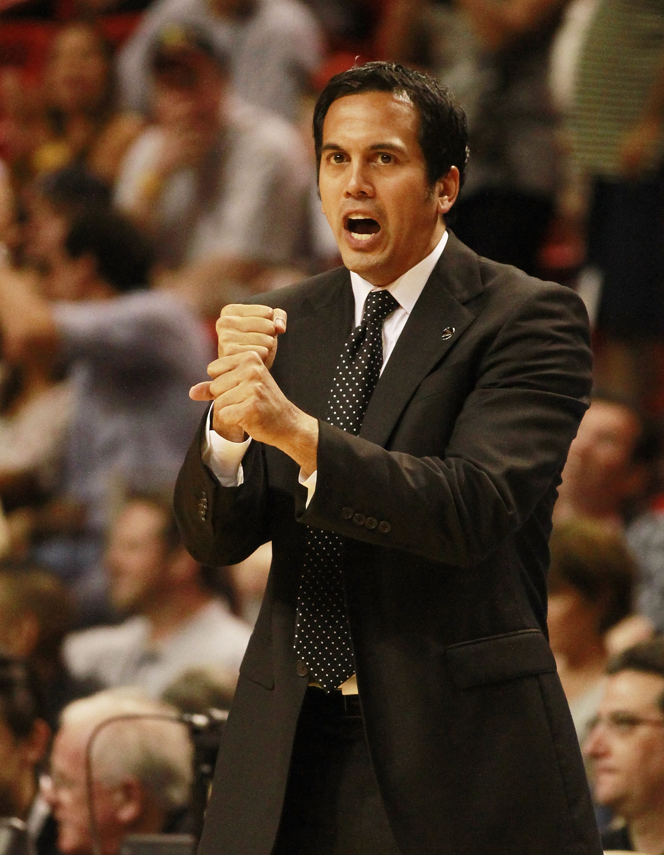 MIAMI, FL - MARCH 25:  Coach Erik Spoelstra of the Miami Heat reacts during a game againts the Philadelphia Sixers at American Airlines Arena on March 25, 2011 in Miami, Florida. The Heat defeated the Sixers 111-99. NOTE TO USER: User expressly acknowledg