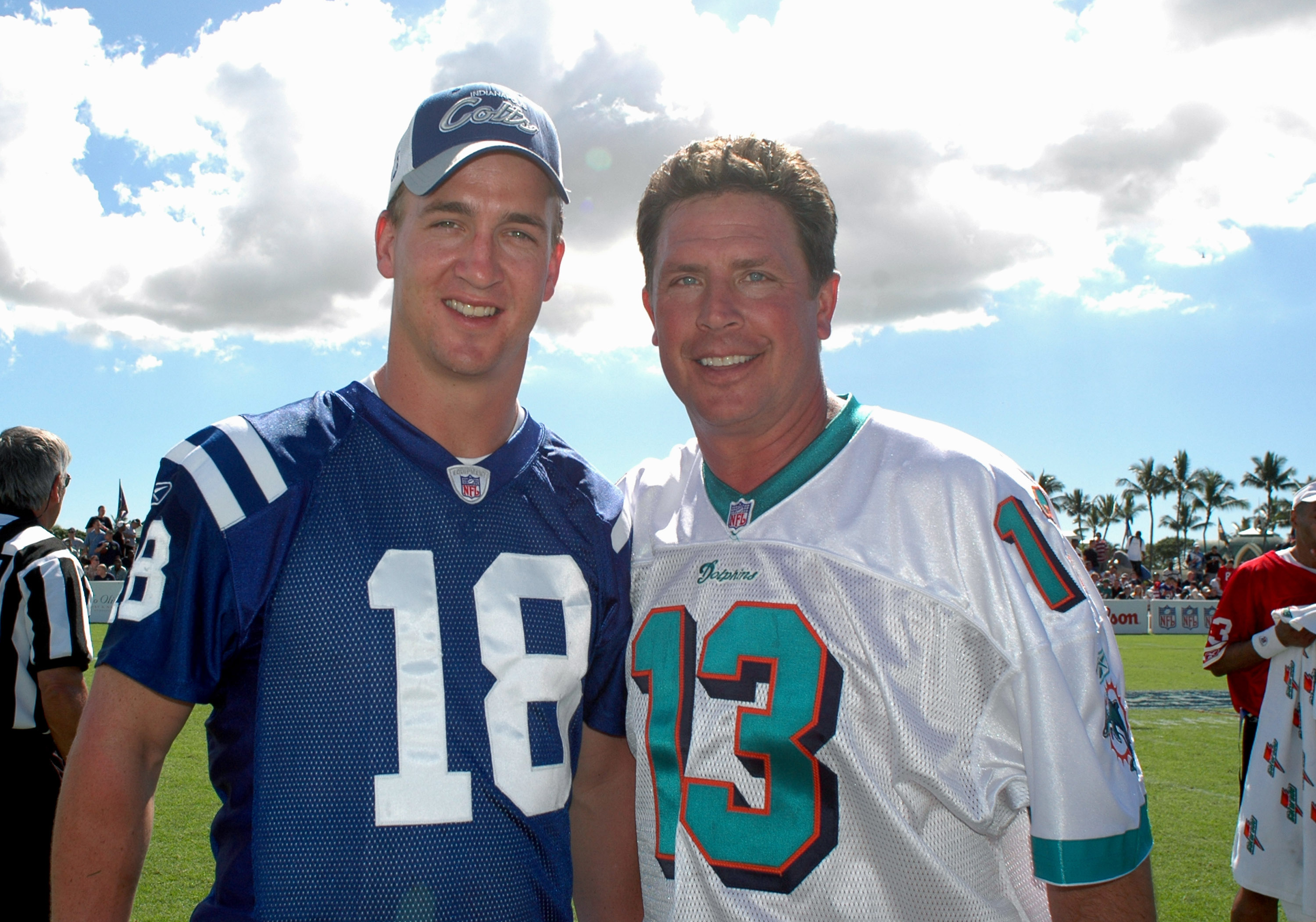 Indianapolis Colts quarterback Peyton Manning  and Miami Dolphins quarterback Dan Marino pose for a photo  during a flag-football legends  game during 2005 Pro Bowl week in Ko Olina, Honolulu February 11, 2005. (Photo by Al Messerschmidt/Getty Images)