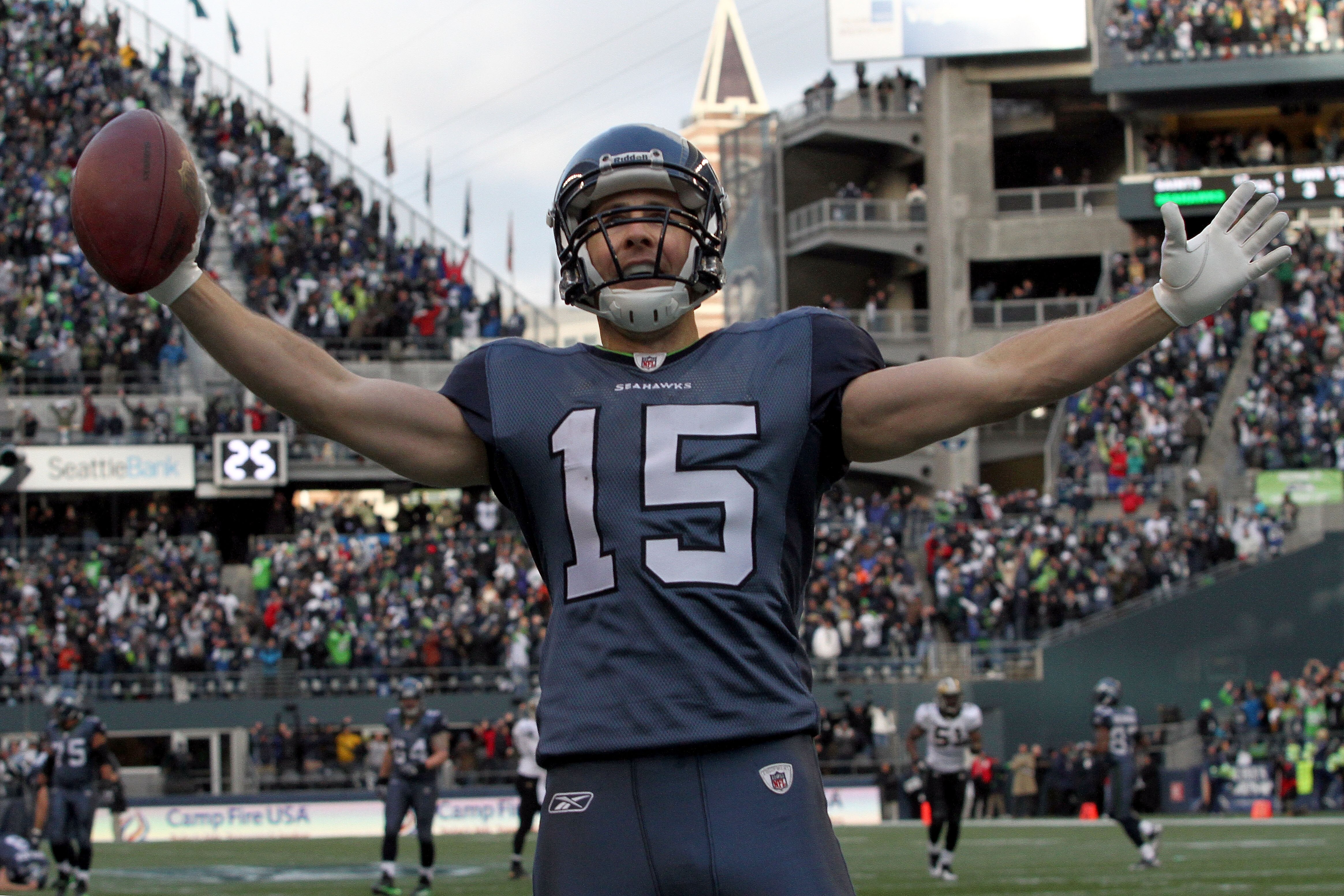 SEATTLE, WA - JANUARY 08:  Brandon Stokley #15 of the Seattle Seahawks reacts after his 45-yard touchdown catch late in the second quarter against the New Orleans Saints during the 2011 NFC wild-card playoff game at Qwest Field on January 8, 2011 in Seatt