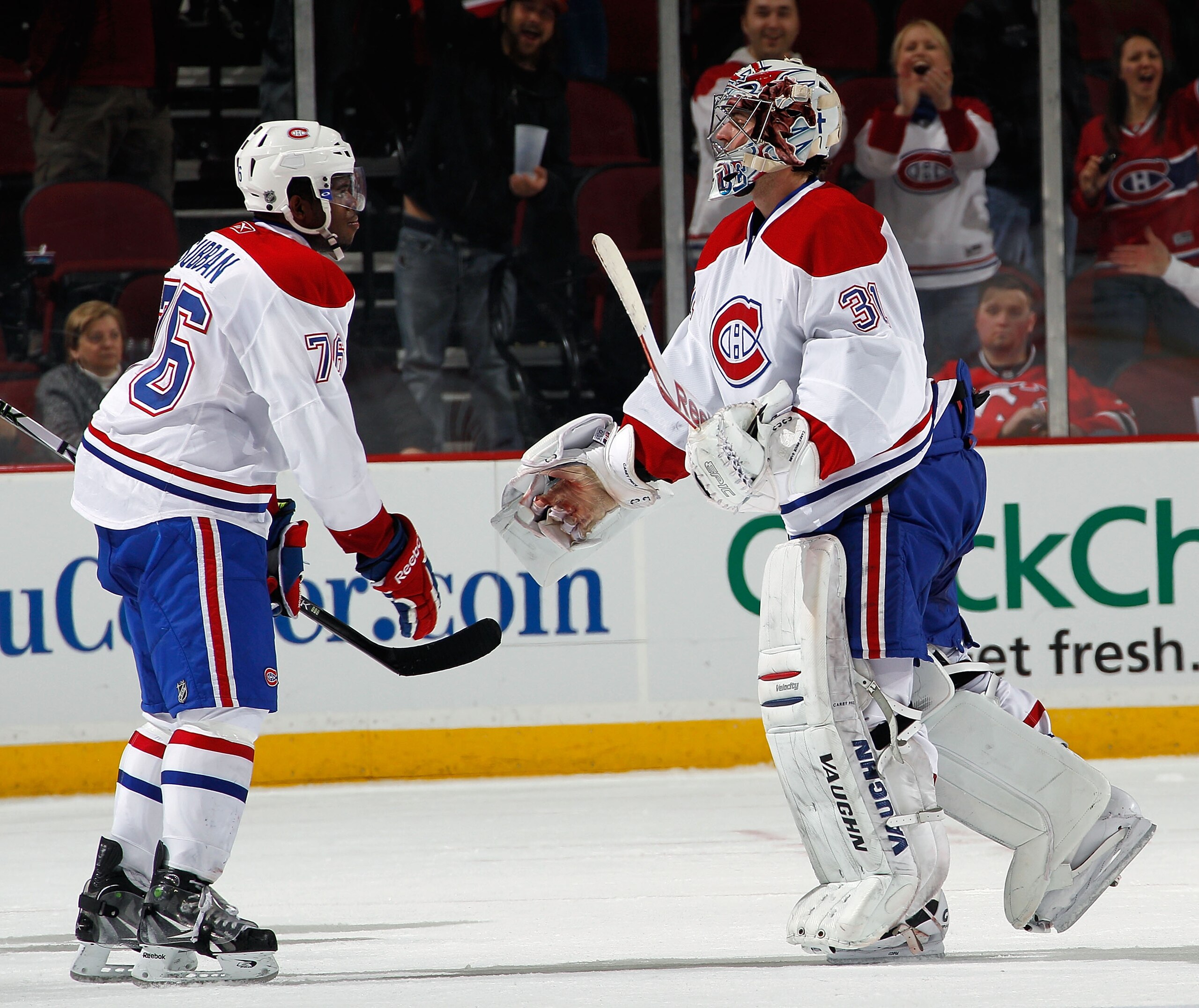 NEWARK, NJ - APRIL 02:  P.K. Subban #76 of the Montreal Canadians congratulates goalie Carey Price #31 on a win over the New Jersey Devils in an NHL hockey game at the Prudential Center on April 2, 2011 in Newark, New Jersey.  (Photo by Paul Bereswill/Get
