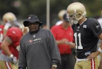 Jimmy Raye took the job as 49ers' offensive coordinator after Smith suffered a shoulder injury.