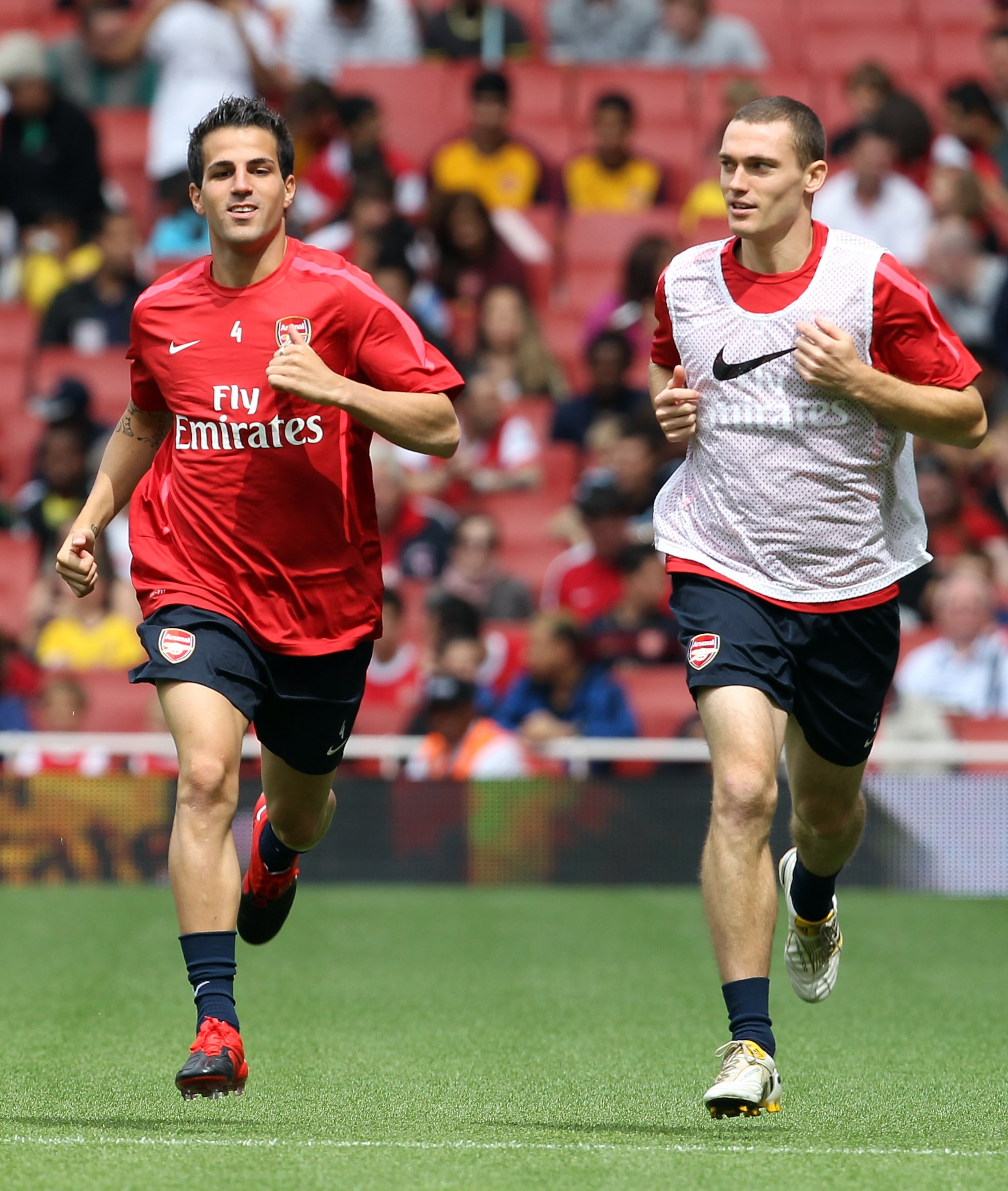 LONDON, ENGLAND - AUGUST 05:  Cesc Fabregas and Thomas Vermaelen attend an Arsenal open training session at Emirates Stadium on August 5, 2010 in London, England.  (Photo by Bryn Lennon/Getty Images)