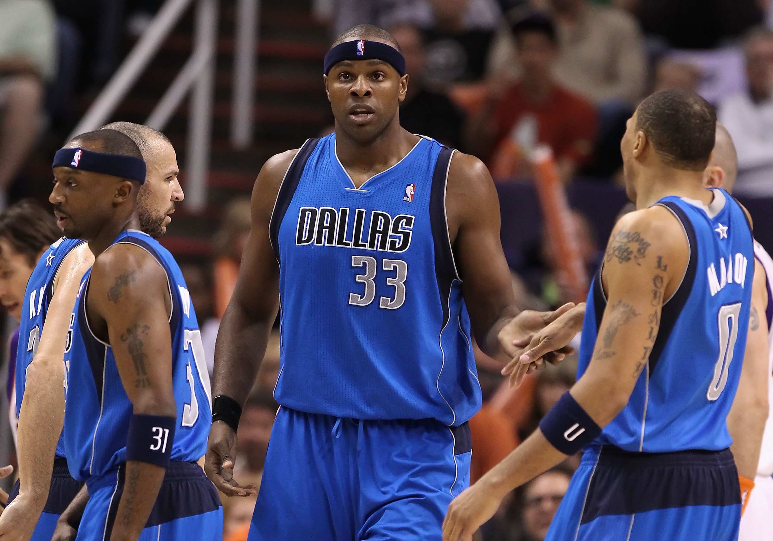 PHOENIX, AZ - FEBRUARY 17: Brendan Haywood #33 of the Dallas Mavericks high fives teammates after scoring against the Phoenix Suns during the NBA game at US Airways Center on February 17, 2011 in Phoenix, Arizona. NOTE TO USER: User expressly acknowledg PHOENIX, AZ - FEBRUARY 17: Brendan Haywood #33 of the Dallas Mavericks high fives teammates after scoring against the Phoenix Suns during the NBA game at US Airways Center on February 17, 2011 in Phoenix, Arizona. NOTE TO USER: User expressly acknowledg