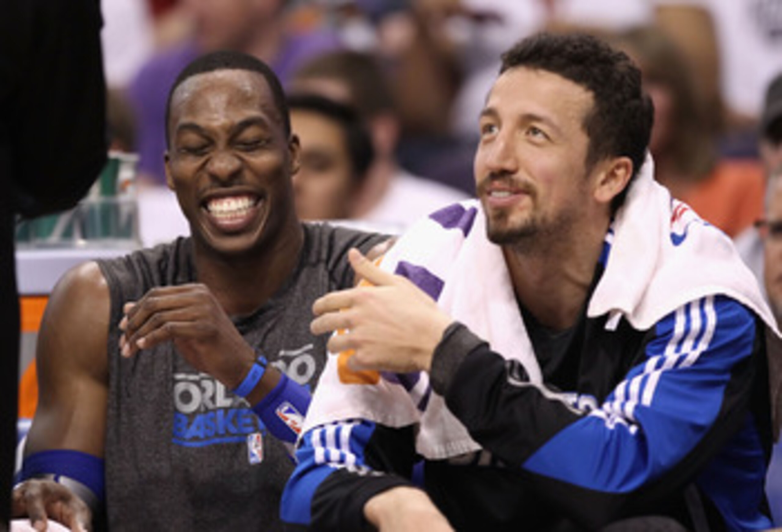 PHOENIX, AZ - MARCH 13: Dwight Howard #12 and Hedo Turkoglu #15 of the Orlando Magic laugh on the bench during the NBA game against the Phoenix Suns at US Airways Center on March 13, 2011 in Phoenix, Arizona. The Magic defeated the Suns 111-88. NOTE TO PHOENIX, AZ - MARCH 13: Dwight Howard #12 and Hedo Turkoglu #15 of the Orlando Magic laugh on the bench during the NBA game against the Phoenix Suns at US Airways Center on March 13, 2011 in Phoenix, Arizona. The Magic defeated the Suns 111-88. NOTE TO