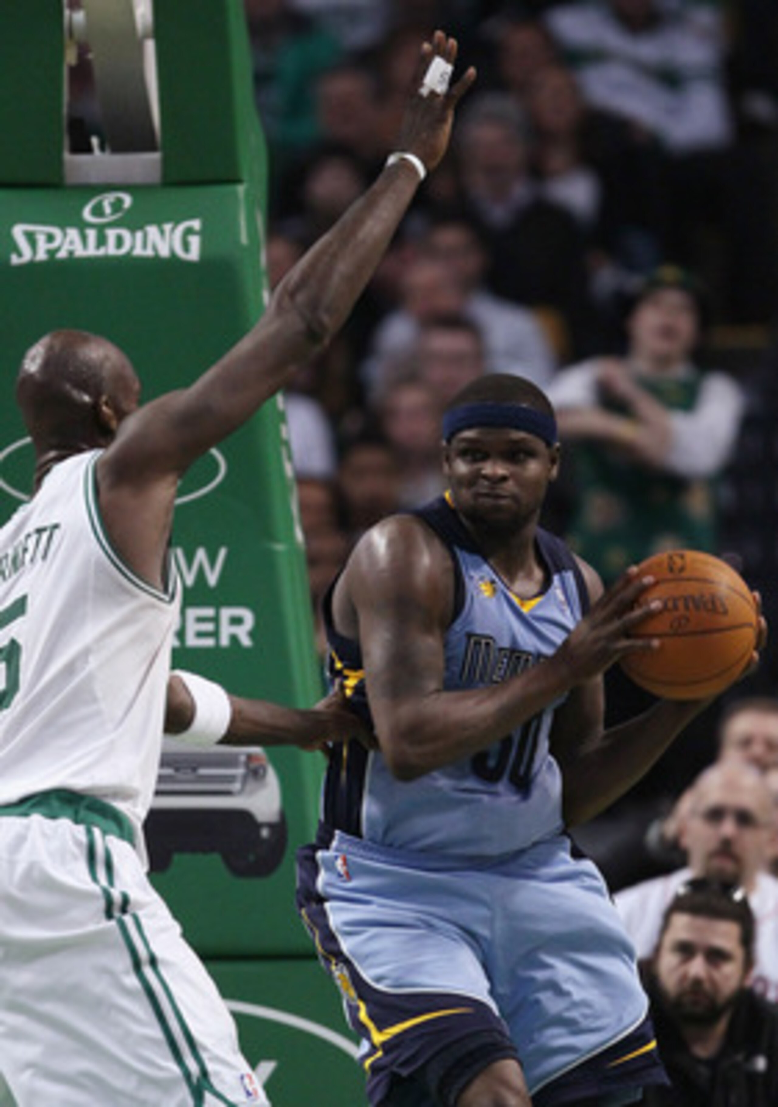 BOSTON, MA - MARCH 23: Zach Randolph #50 of the Memphis Grizzlies looks to pass around Kevin Garnett #5 of the Boston Celtics on March 23, 2011 at the TD Garden in Boston, Massachusetts. The Memphis Grizzlies defeated the Boston Celtics 90-87. NOTE TO U BOSTON, MA - MARCH 23: Zach Randolph #50 of the Memphis Grizzlies looks to pass around Kevin Garnett #5 of the Boston Celtics on March 23, 2011 at the TD Garden in Boston, Massachusetts. The Memphis Grizzlies defeated the Boston Celtics 90-87. NOTE TO U