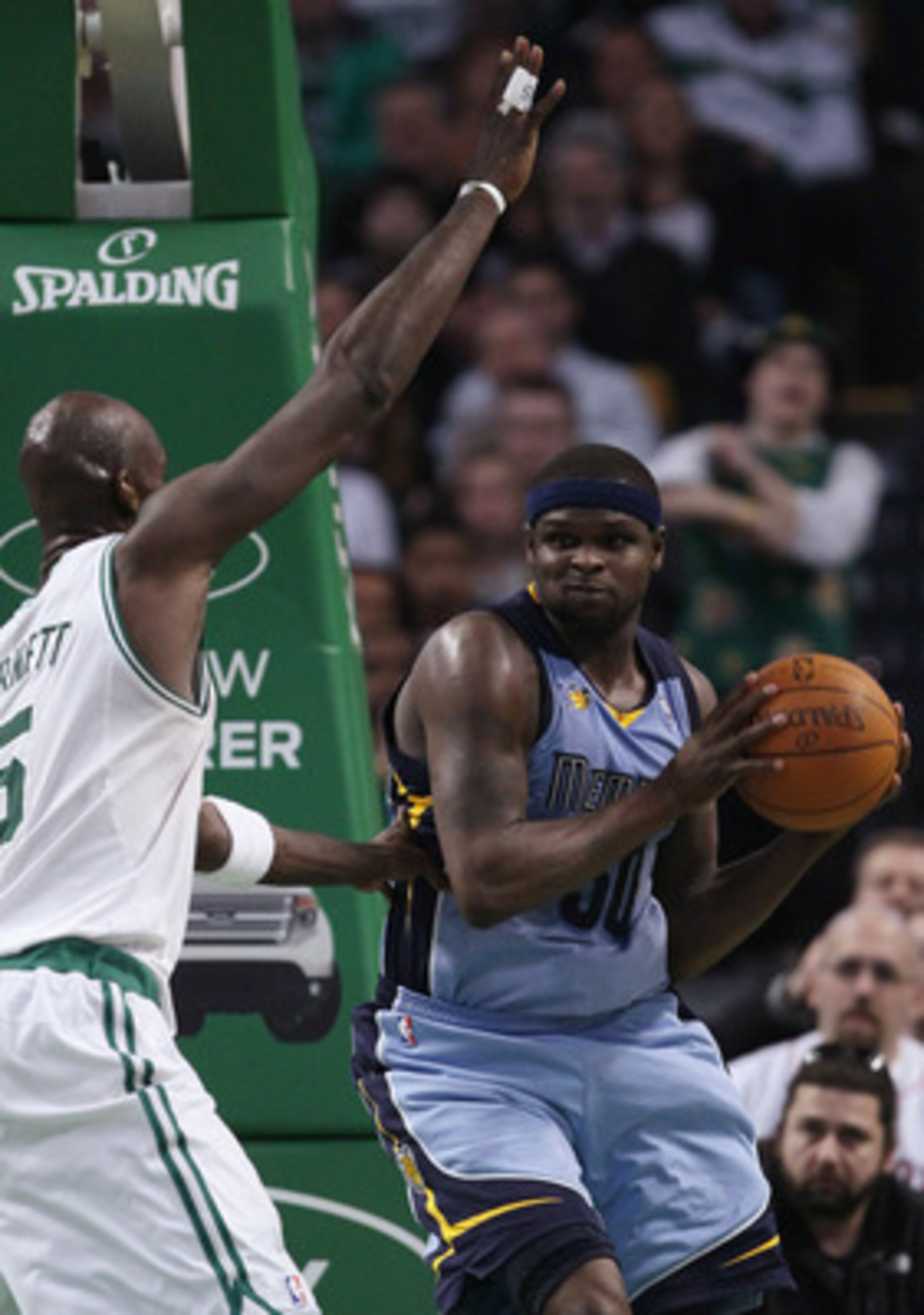BOSTON, MA - MARCH 23:  Zach Randolph #50 of the Memphis Grizzlies looks to pass around Kevin Garnett #5 of the Boston Celtics on March 23, 2011 at the TD Garden in Boston, Massachusetts.  The Memphis Grizzlies defeated the Boston Celtics 90-87. NOTE TO U