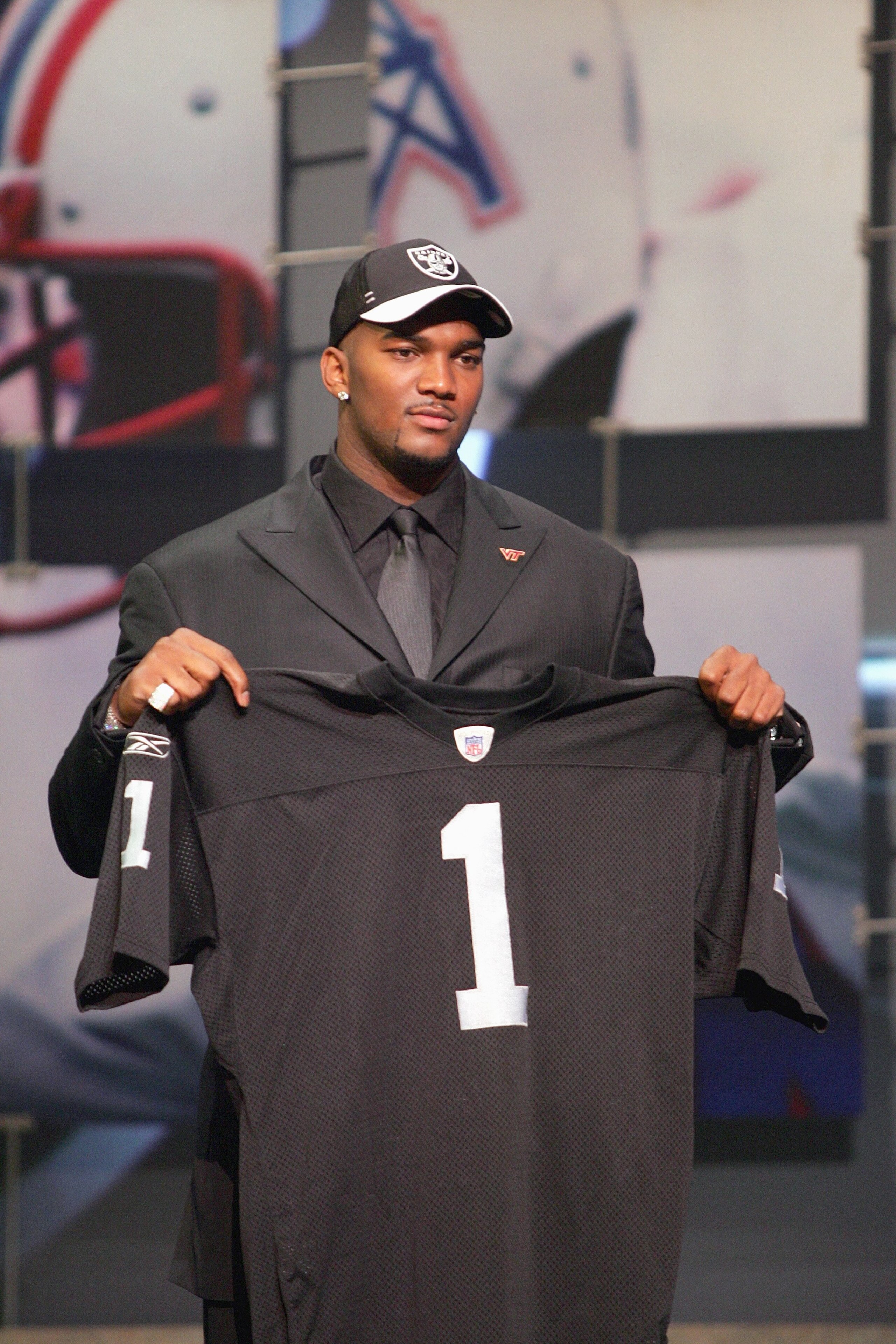 NEW YORK - APRIL 28: Quarterback JaMarcus Russell of LSU poses for a photo after being drafted by the Oakland Raiders during the 2007 NFL Draft on April 28, 2007 at Radio City Music Hall in New York, New York. (Photo by Chris McGrath/Getty Images) NEW YORK - APRIL 28: Quarterback JaMarcus Russell of LSU poses for a photo after being drafted by the Oakland Raiders during the 2007 NFL Draft on April 28, 2007 at Radio City Music Hall in New York, New York. (Photo by Chris McGrath/Getty Images)