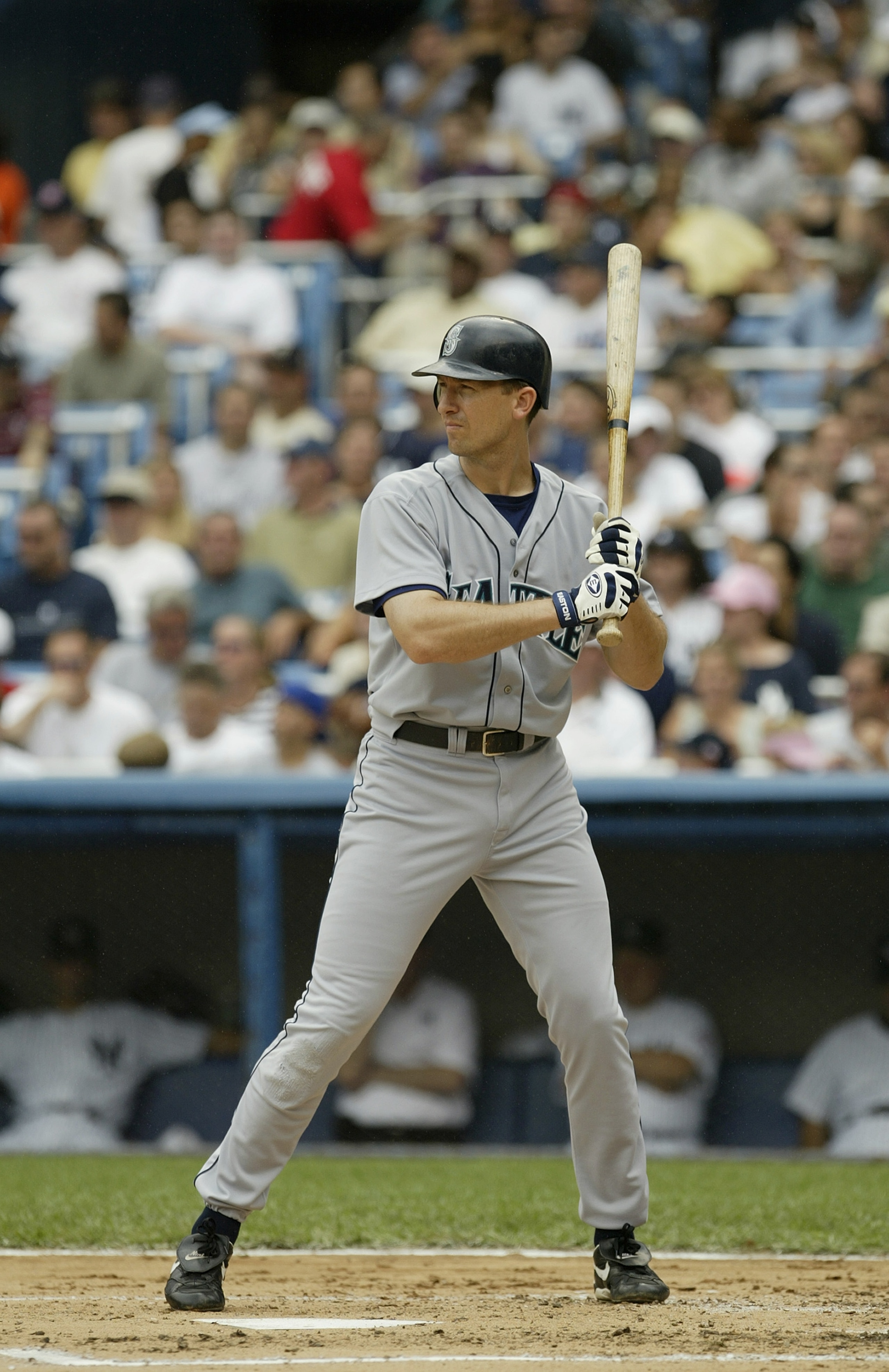 BRONX, NY- AUGUST 9 : Infielder John Olerud #5 of the Seattle Mariners at bat against the New York Yankees during the MLB game at Yankee Stadium on August 9, 2003 in the Bronx, New York. The Mariners defeated the Yankees 2-1 . (Photo by Chris Trotman/Gett