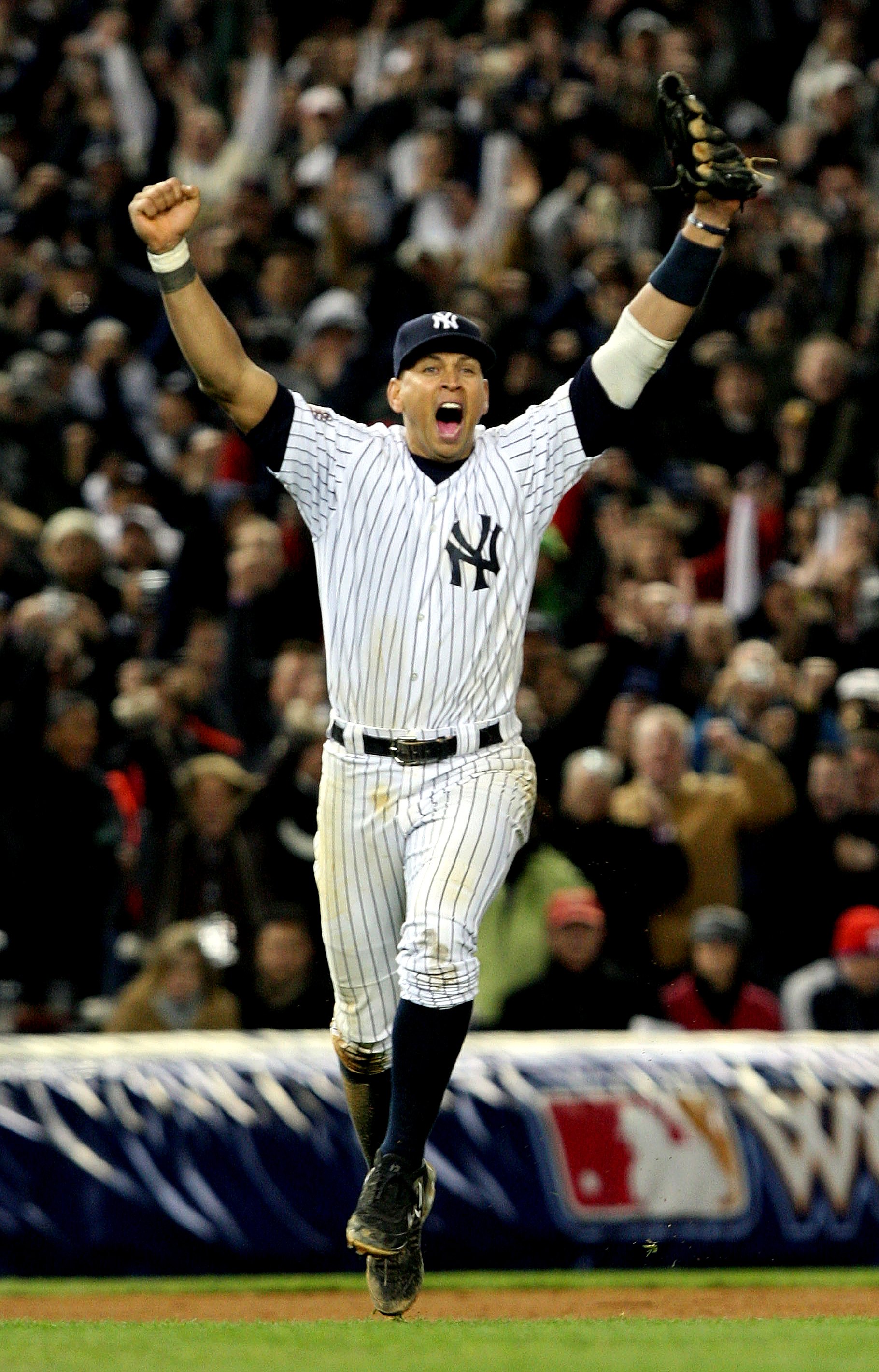 NEW YORK - NOVEMBER 04:  Alex Rodriguez #13 of the New York Yankees celebrates after their 7-3 win against the Philadelphia Phillies in Game Six of the 2009 MLB World Series at Yankee Stadium on November 4, 2009 in the Bronx borough of New York City.  (Ph
