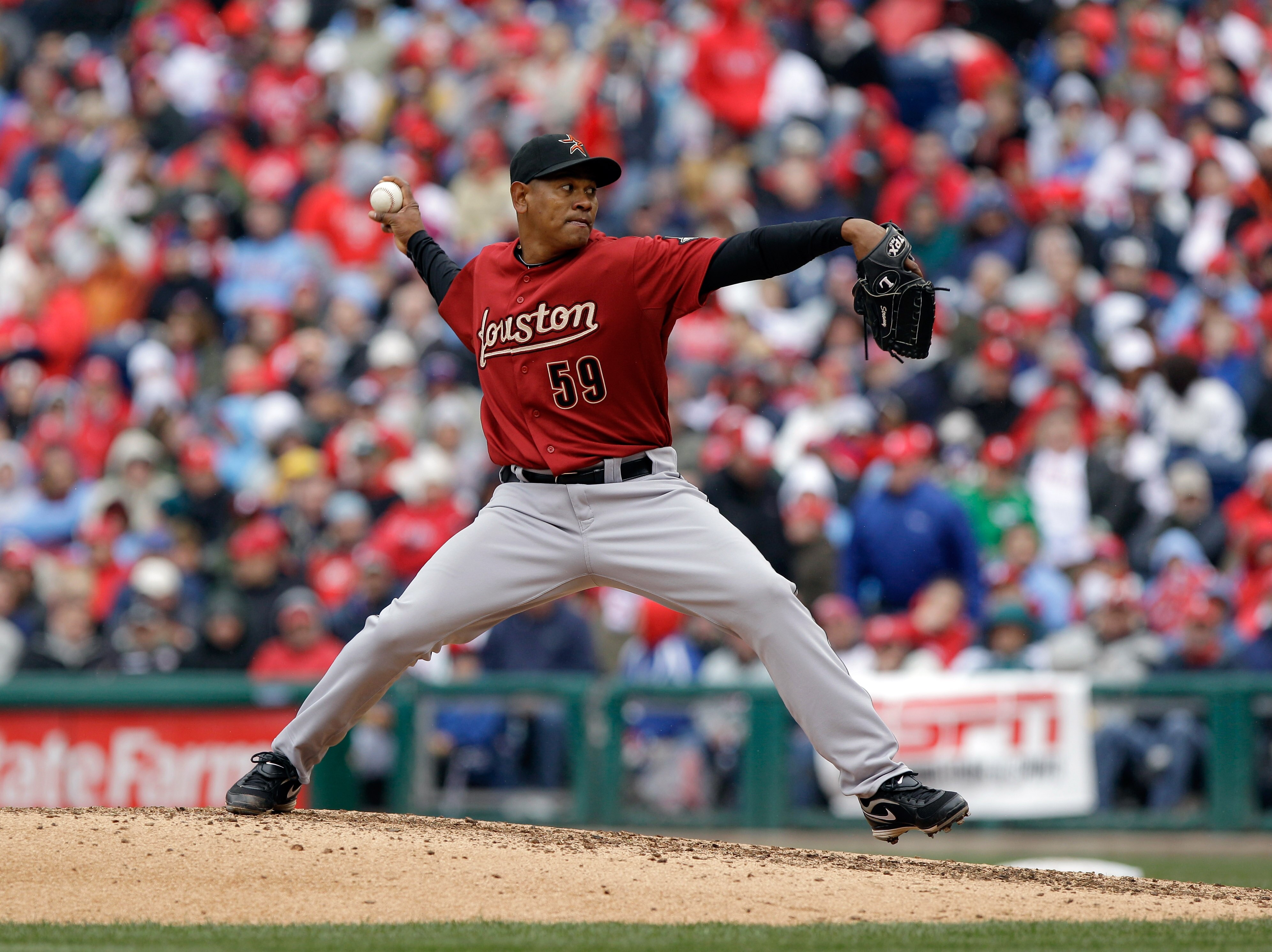 PHILADELPHIA, PA - APRIL 01:  Reliever Wilton Lopez #59 of the Houston Astros delivers to a Philadelphia Phillies batter during opening day at Citizens Bank Park on April 1, 2011 in Philadelphia, Pennsylvania.  (Photo by Rob Carr/Getty Images)