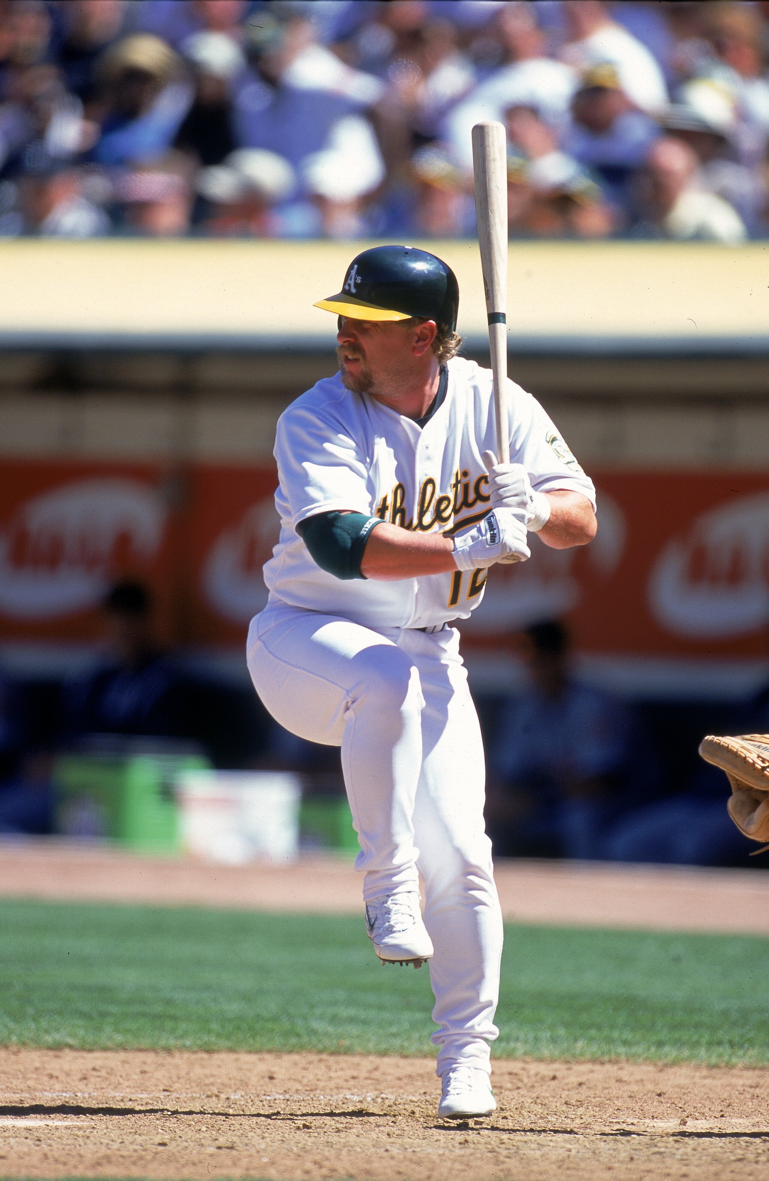 13 Aug 2000: Matt Stairs #12 of the Oakland Athletics steps into the swing during the game against the Detroit Tigers  at the Network Associates Coliseum in Oakland, California. The Tigers defeated the Athletics 5-3.Mandatory Credit: Tom Hauck  /Allsport