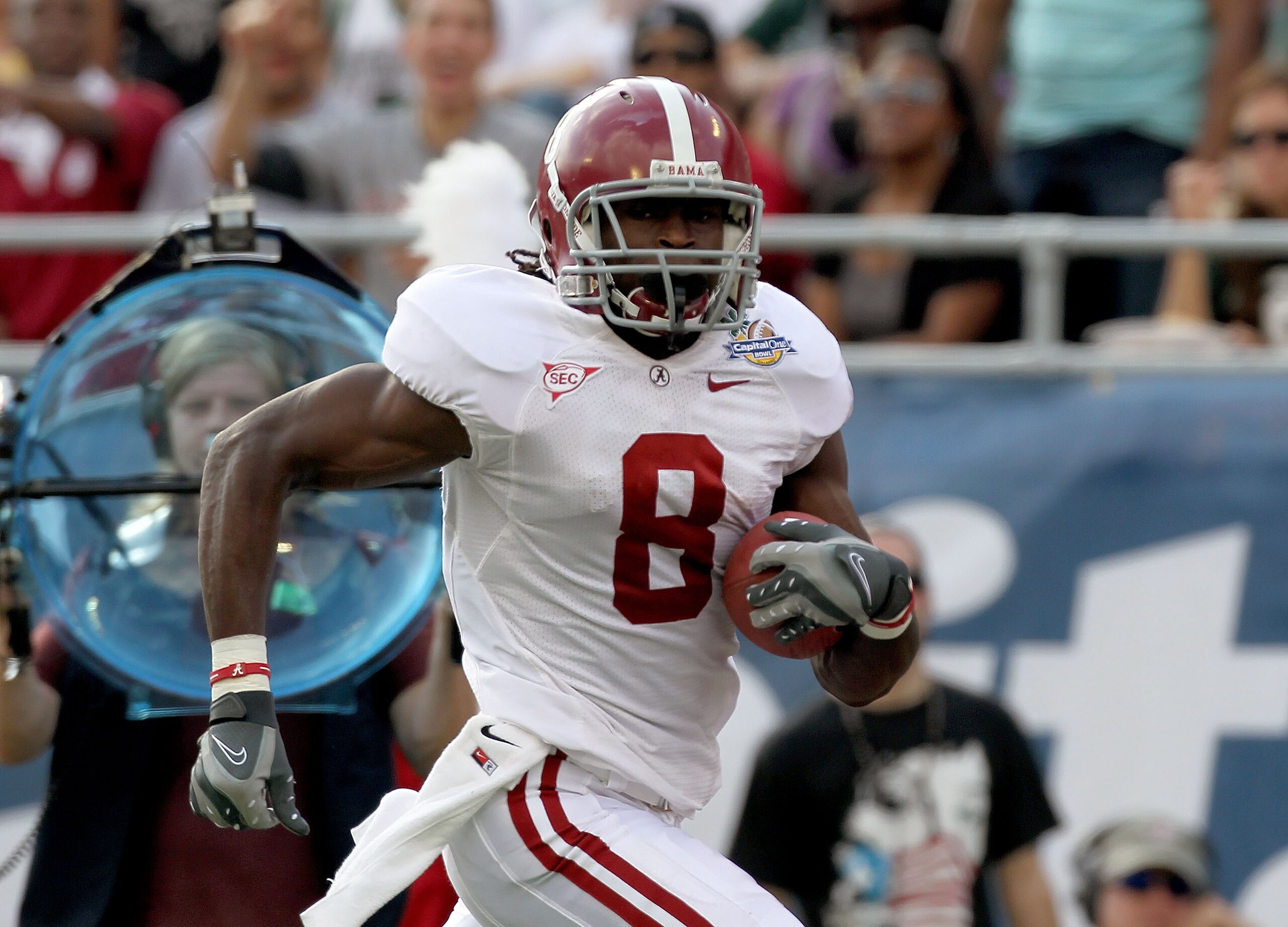 ORLANDO, FL - JANUARY 01:  Julio Jones #8 of the Alabama Crimson Tide rushes for a touchdown during the Capitol One Bowl against the Michigan State Spartans at the Florida Citrus Bowl on January 1, 2011 in Orlando, Florida.  (Photo by Mike Ehrmann/Getty I