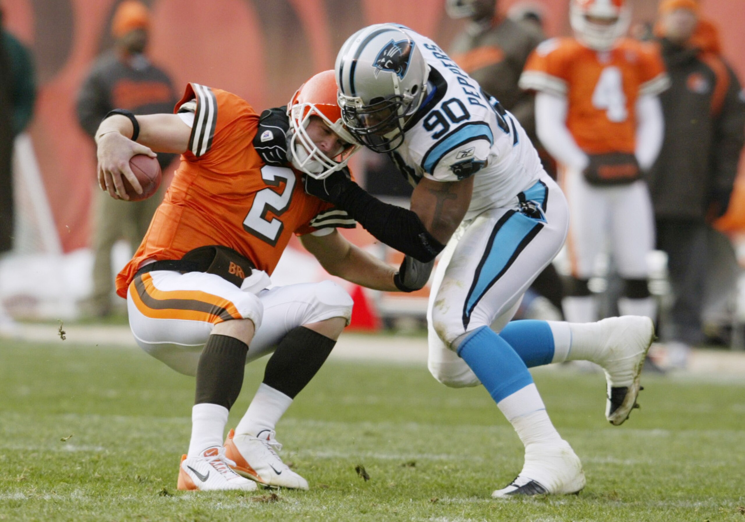 CLEVELAND - DECEMBER 1: Julius Peppers #90 of the Carolina Panthers sacks quarterback Tim Couch #2 of the Cleveland Browns on December 1, 2002 at Browns Stadium in Cleveland, Ohio. Carolina won the game 13-6. (Photo by Tom Pidgeon/Getty Images) CLEVELAND - DECEMBER 1: Julius Peppers #90 of the Carolina Panthers sacks quarterback Tim Couch #2 of the Cleveland Browns on December 1, 2002 at Browns Stadium in Cleveland, Ohio. Carolina won the game 13-6. (Photo by Tom Pidgeon/Getty Images)