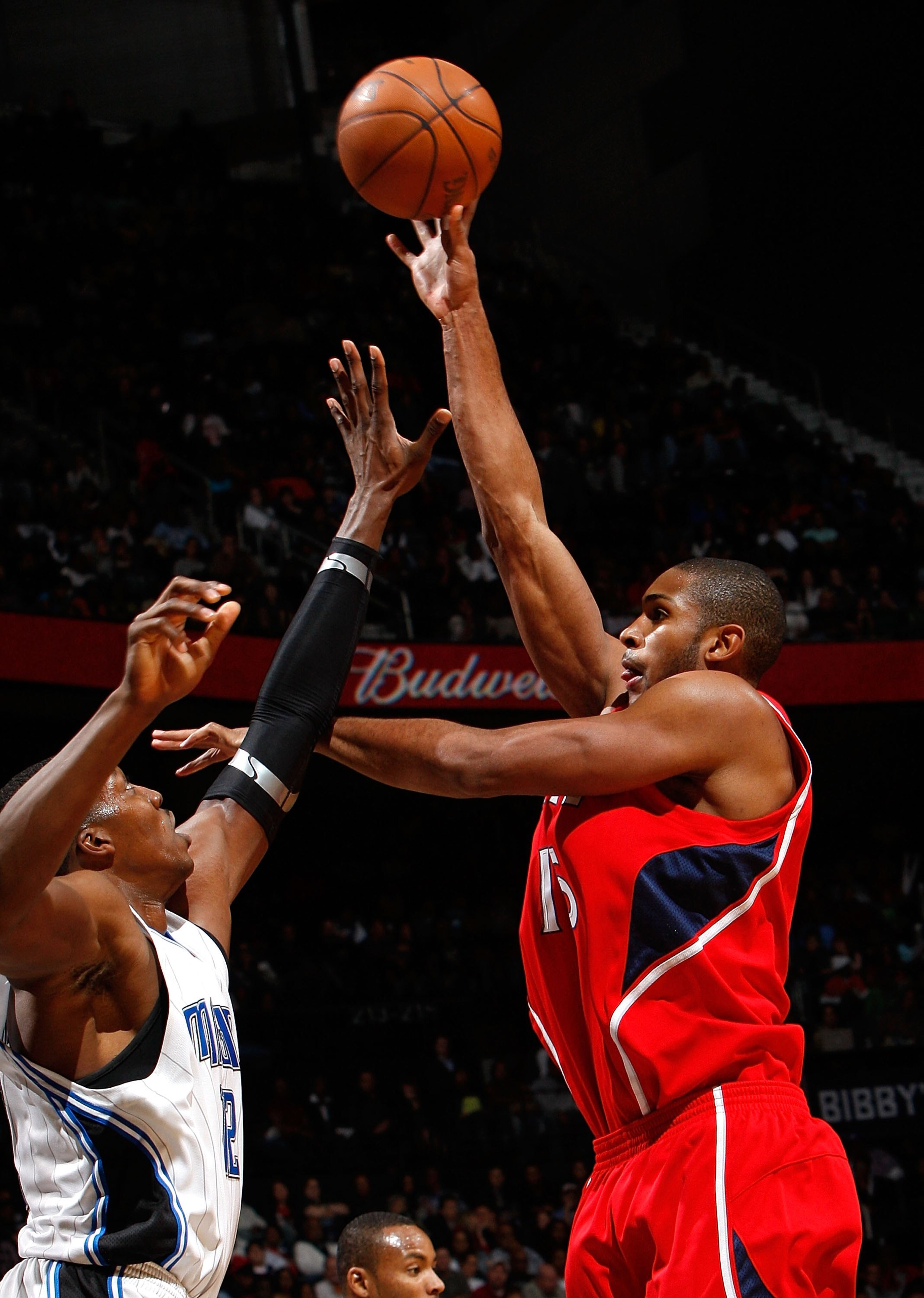 ATLANTA - NOVEMBER 26: Al Horford #15 of the Atlanta Hawks against Dwight Howard #12 of the Orlando Magic at Philips Arena on November 26, 2009 in Atlanta, Georgia. NOTE TO USER: User expressly acknowledges and agrees that, by downloading and/or using t ATLANTA - NOVEMBER 26: Al Horford #15 of the Atlanta Hawks against Dwight Howard #12 of the Orlando Magic at Philips Arena on November 26, 2009 in Atlanta, Georgia. NOTE TO USER: User expressly acknowledges and agrees that, by downloading and/or using t