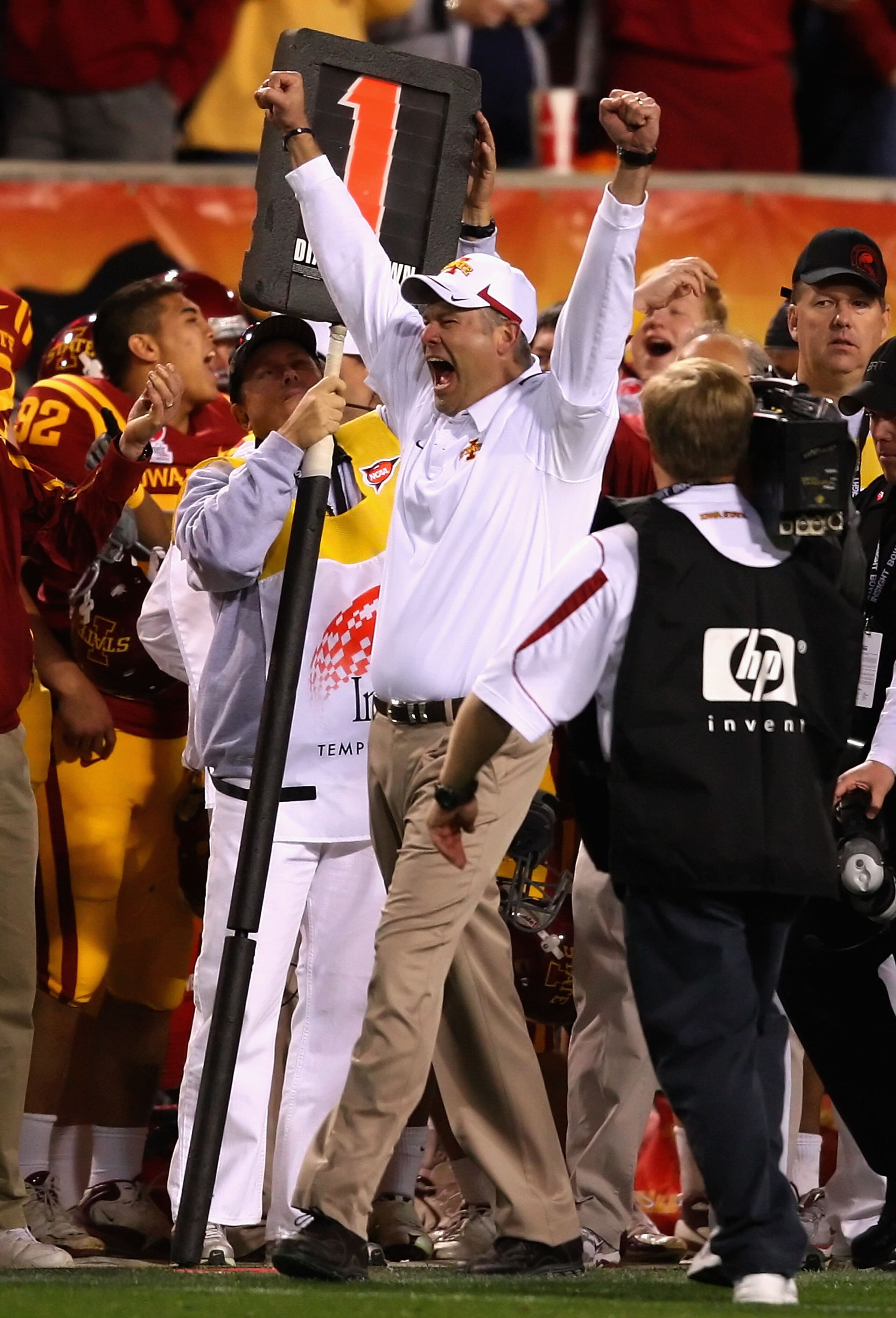 TEMPE, AZ - DECEMBER 31:  Head coach Paul Rhoads of the Iowa State Cyclones celebrates on the sidelines after defeating the Minnesota Golden Gophers in the Insight Bowl at Arizona Stadium on December 31, 2009 in Tempe, Arizona.  The Cyclones defeated the