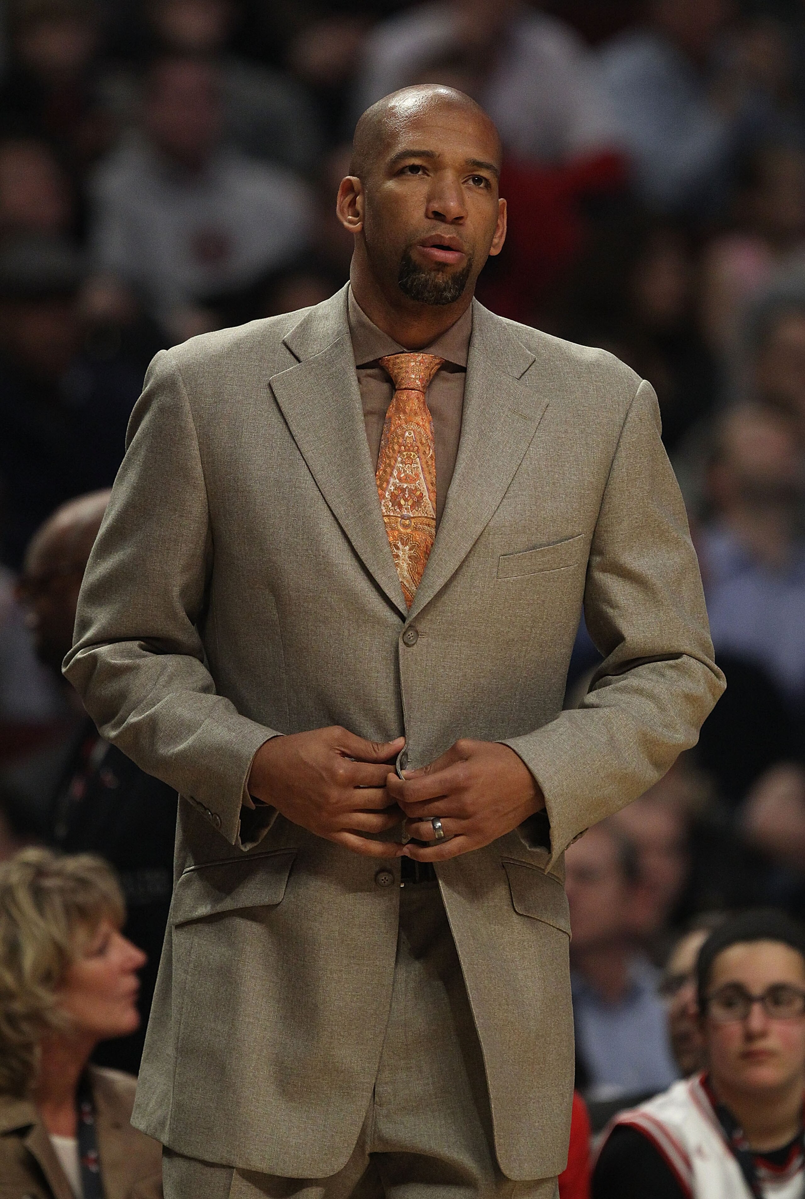 CHICAGO, IL - MARCH 07: Head coach Monty Williams of the New Orleans Hornets watches as his team takes on the Chicago Bulls at the United Center on March 7, 2011 in Chicago, Illinois. The Bulls defeated the Hornets 85-77. NOTE TO USER: User expressly ackn