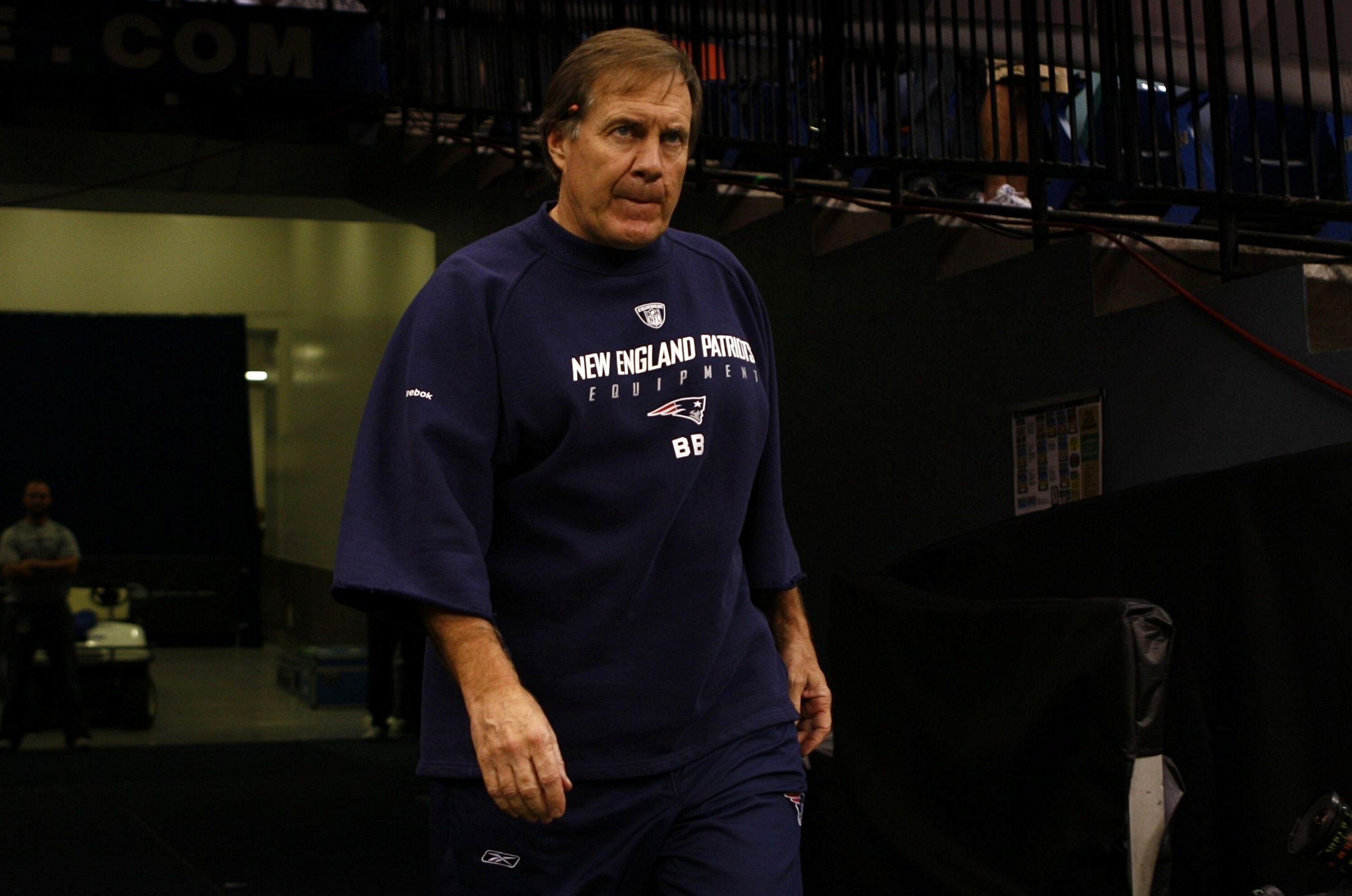 NEW ORLEANS - NOVEMBER 30: Head coach Bill Belichick of the New England Patriots walks out of the tunnel onto the field for warm ups against the New Orleans Saints at Louisana Superdome on November 30, 2009 in New Orleans, Louisiana. (Photo by Scott Halle