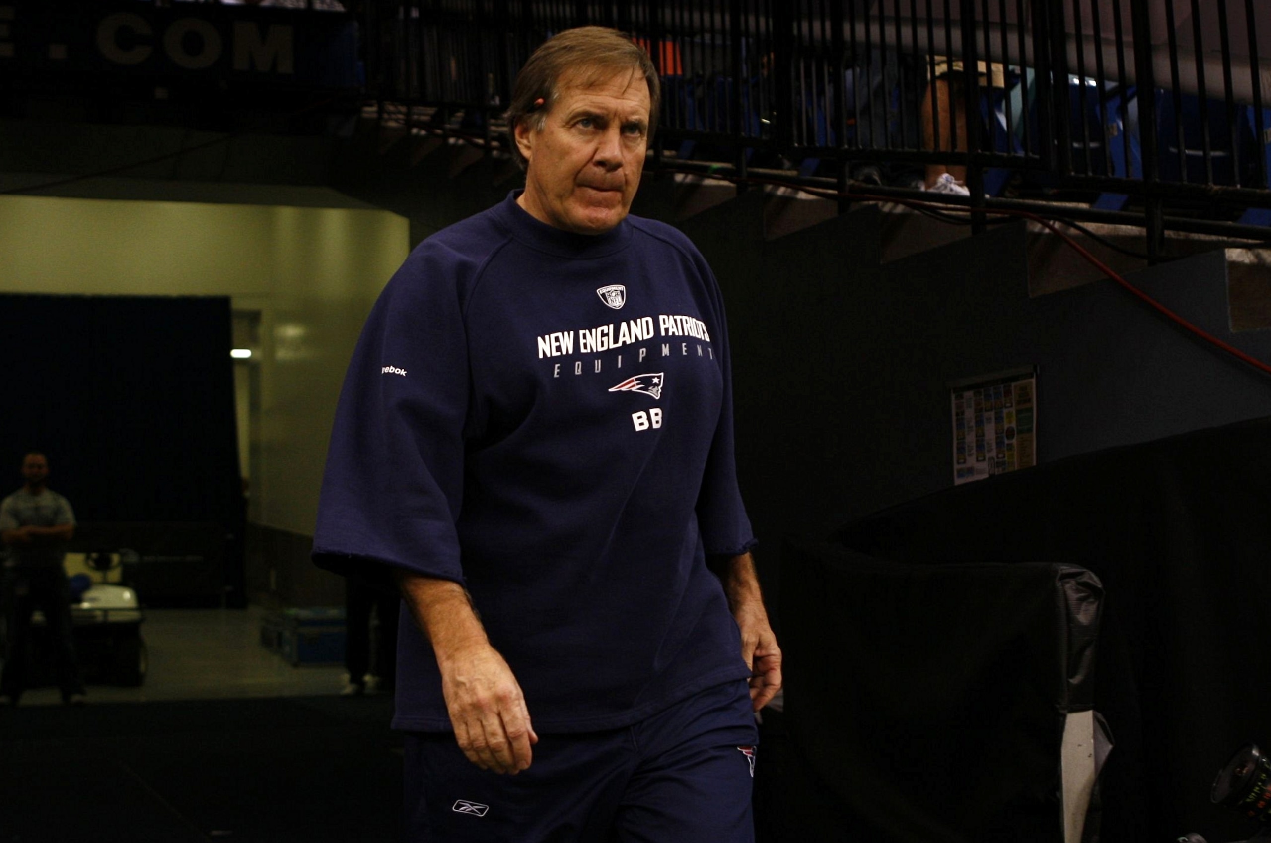 NEW ORLEANS - NOVEMBER 30: Head coach Bill Belichick of the New England Patriots walks out of the tunnel onto the field for warm ups against the New Orleans Saints at Louisana Superdome on November 30, 2009 in New Orleans, Louisiana. (Photo by Scott Halle