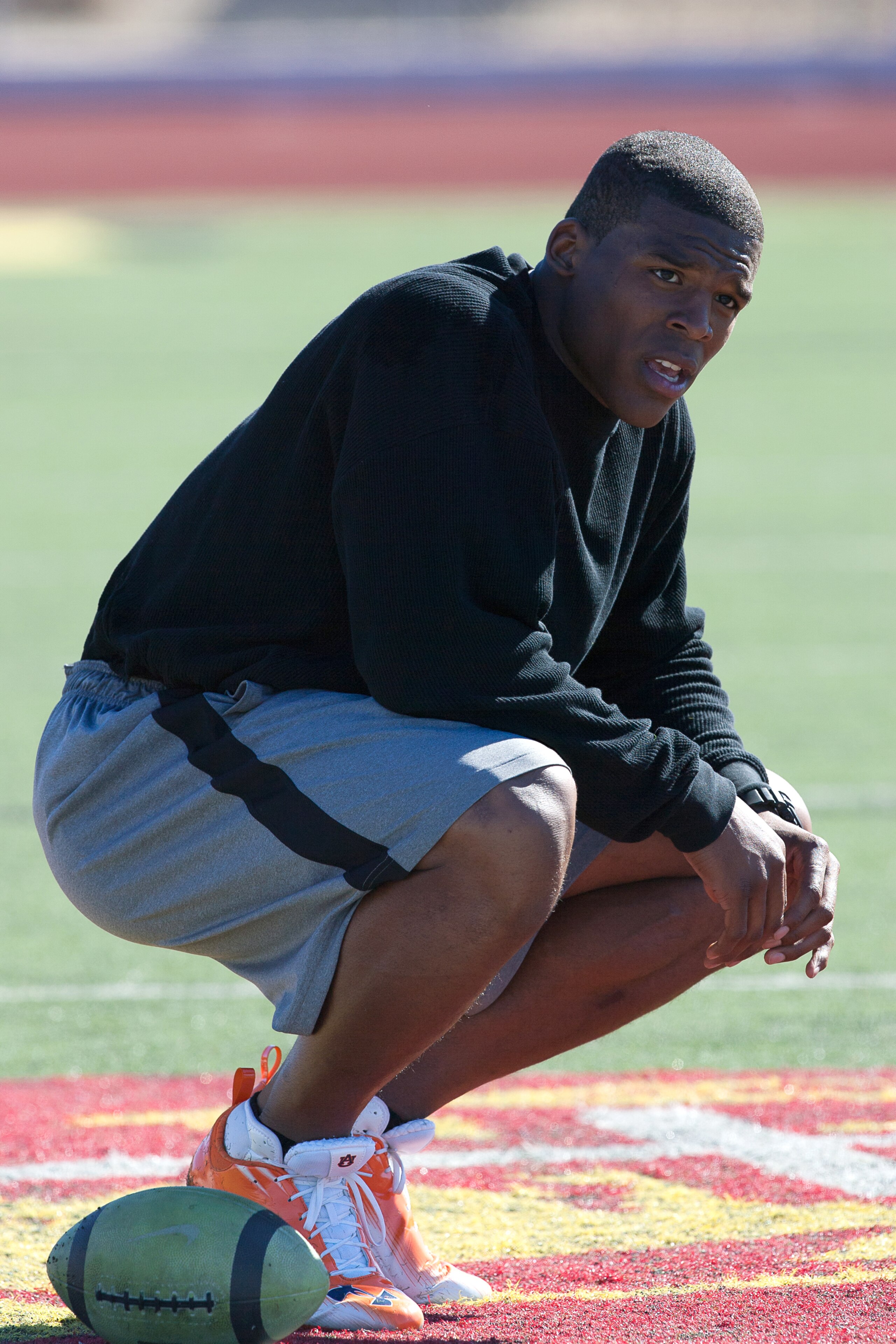 SAN DIEGO, CA - FEBRUARY 10: 2010 Heisman Trophy winning quarterback Cam Newton of Auburn pauses during his workout routine for the media at Cathedral High School's sports stadium on February 10, 2011 in San Diego, California. (Photo by Kent Horner/ Getty SAN DIEGO, CA - FEBRUARY 10: 2010 Heisman Trophy winning quarterback Cam Newton of Auburn pauses during his workout routine for the media at Cathedral High School's sports stadium on February 10, 2011 in San Diego, California. (Photo by Kent Horner/ Getty