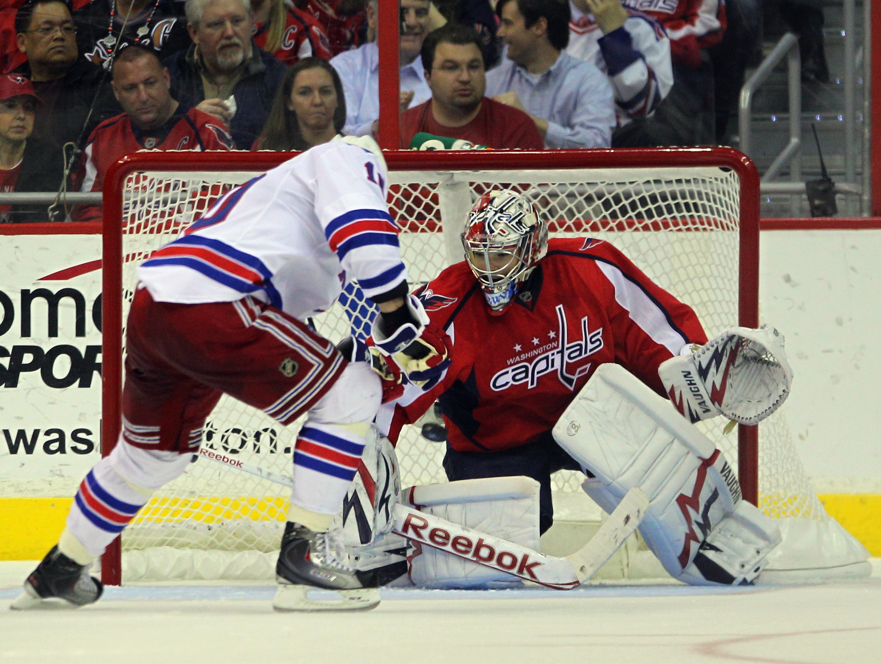 WASHINGTON, DC - APRIL 13: Michal Neuvirth #30 of the Washington Capitals stops Marian Gaborik #10 of the New York Rangers in Game One of the Eastern Conference Quarterfinals during the 2011 NHL Stanley Cup Playoffs at Verizon Center on April 13, 2011 in