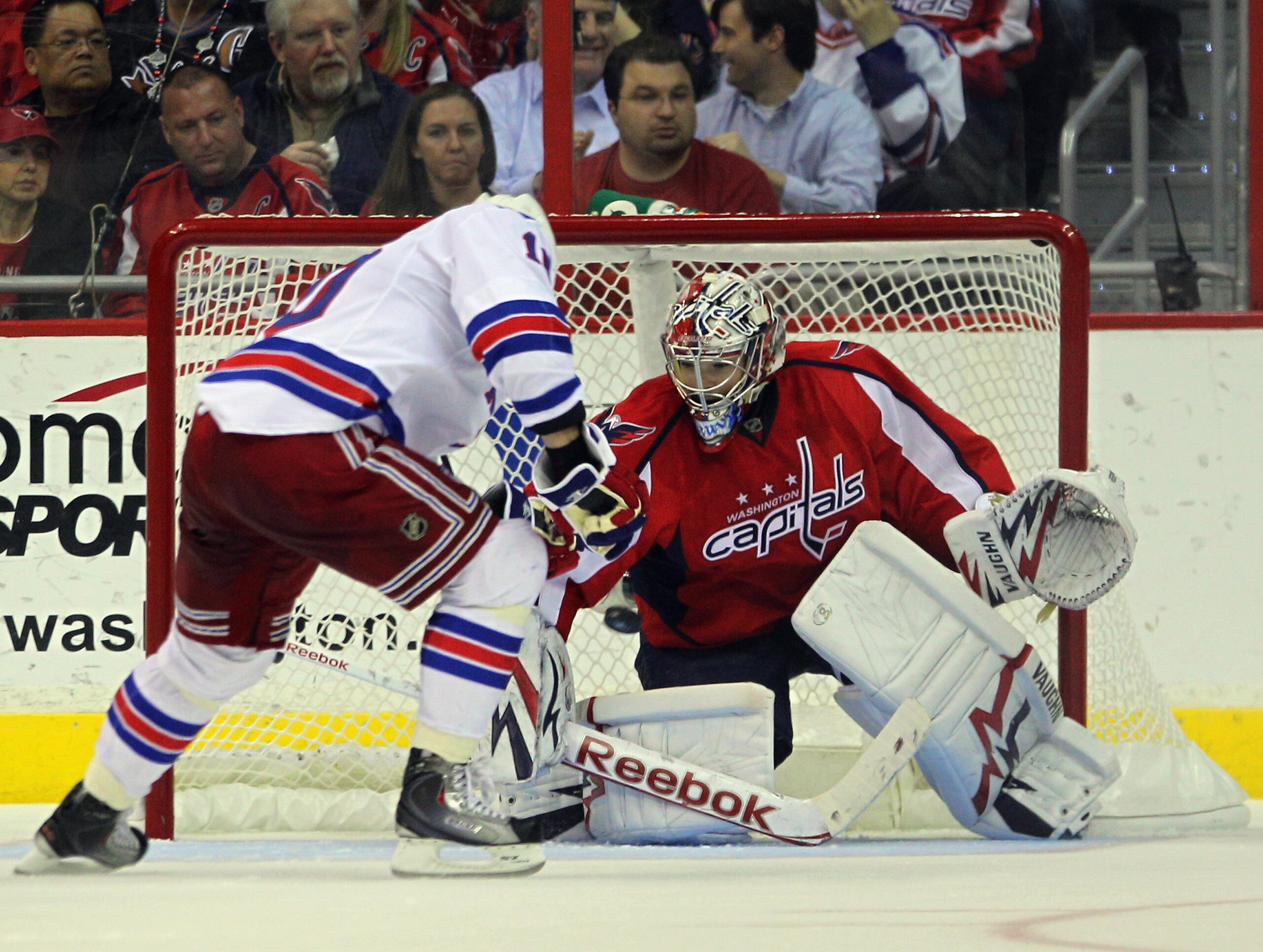 WASHINGTON, DC - APRIL 13: Michal Neuvirth #30 of the Washington Capitals stops Marian Gaborik #10 of the New York Rangers in Game One of the Eastern Conference Quarterfinals during the 2011 NHL Stanley Cup Playoffs at Verizon Center on April 13, 2011 in