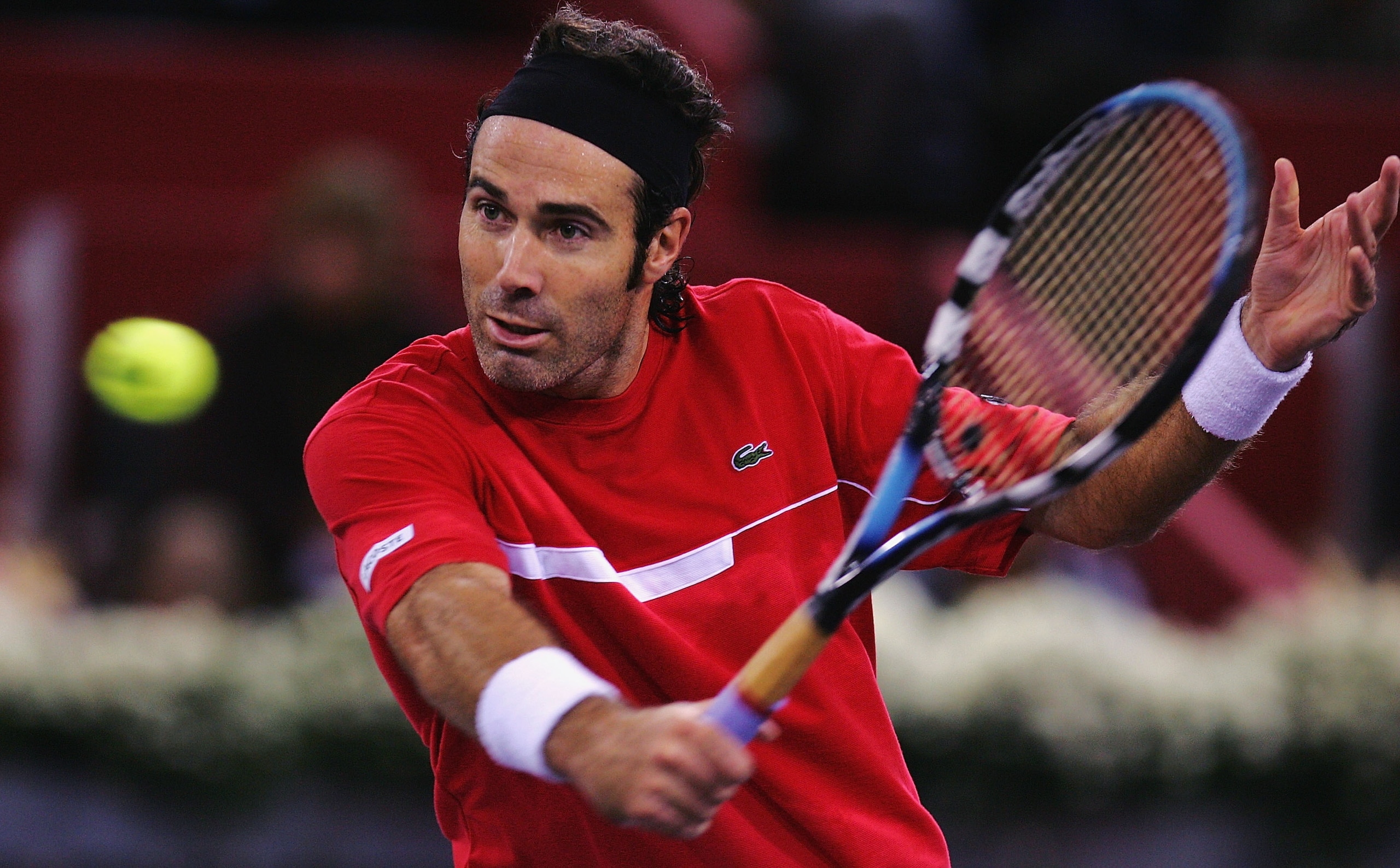 MADRID, SPAIN - OCTOBER 18:  Alex Corretja of Spain plays a back hand during his first round match against David Ferrer of Spain during the ATP Madrid Masters at the Nuevo Rockodromo on October 18, 2004 in Madrid, Spain. (Photo by Jamie McDonald/Getty Ima