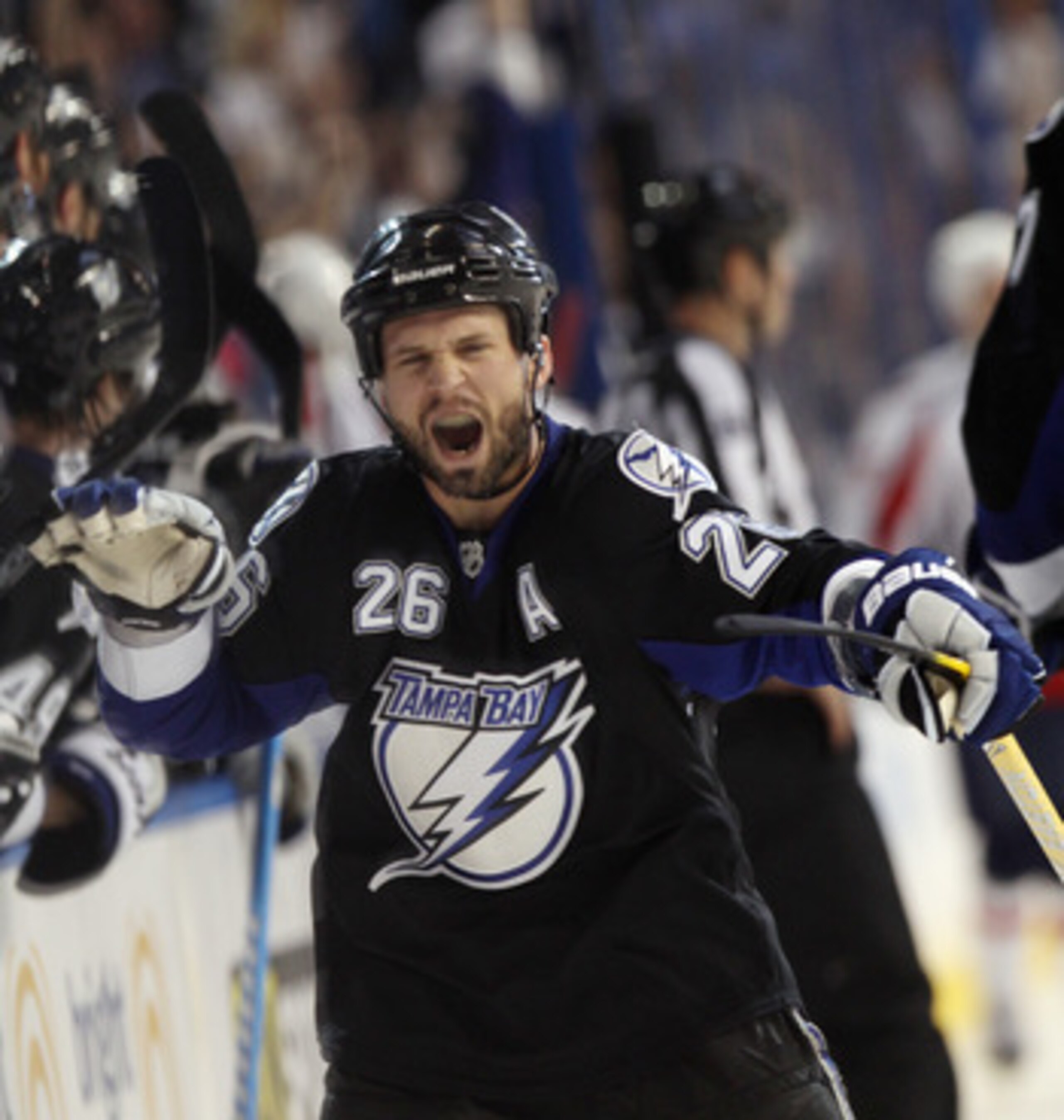 TAMPA, FL - MAY 04:  Martin St. Louis #26 of the Tampa Bay Lightning celebrates his goal at 16:52 of the third period against the Washington Capitals in Game Four of the Eastern Conference Semifinals during the 2011 NHL Stanley Cup Playoffs at the St Pete