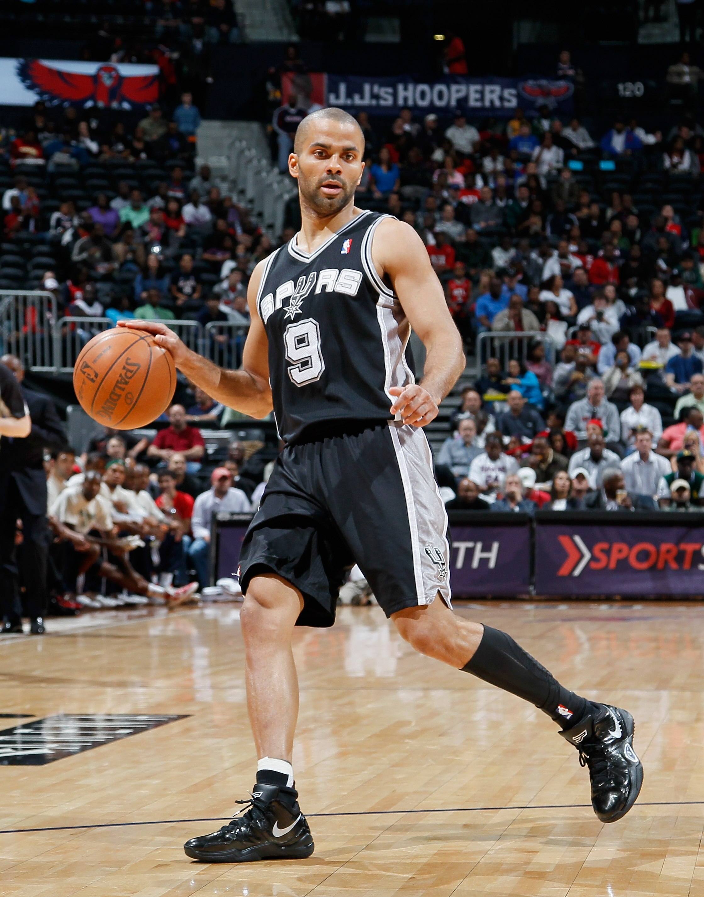 ATLANTA, GA - APRIL 05:  Tony Parker #9 of the San Antonio Spurs against the Atlanta Hawks at Philips Arena on April 5, 2011 in Atlanta, Georgia.  NOTE TO USER: User expressly acknowledges and agrees that, by downloading and/or using this Photograph, user