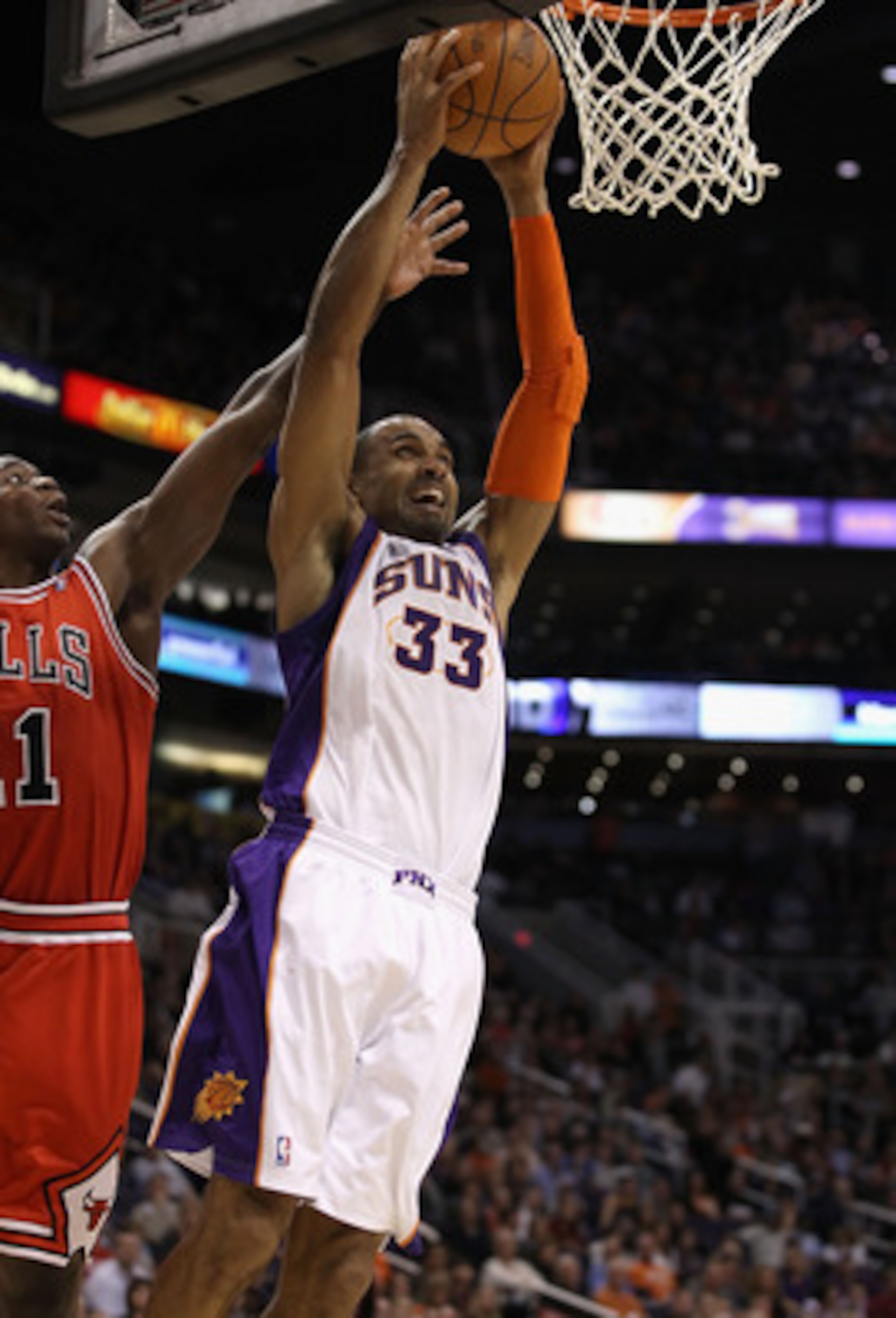 PHOENIX - NOVEMBER 24:  Grant Hill #33 of the Phoenix Suns slam dunks during the NBA game against the Chicago Bulls at US Airways Center on November 24, 2010 in Phoenix, Arizona. The Bulls defeated the Suns 123-115 in double overtime. NOTE TO USER: User e