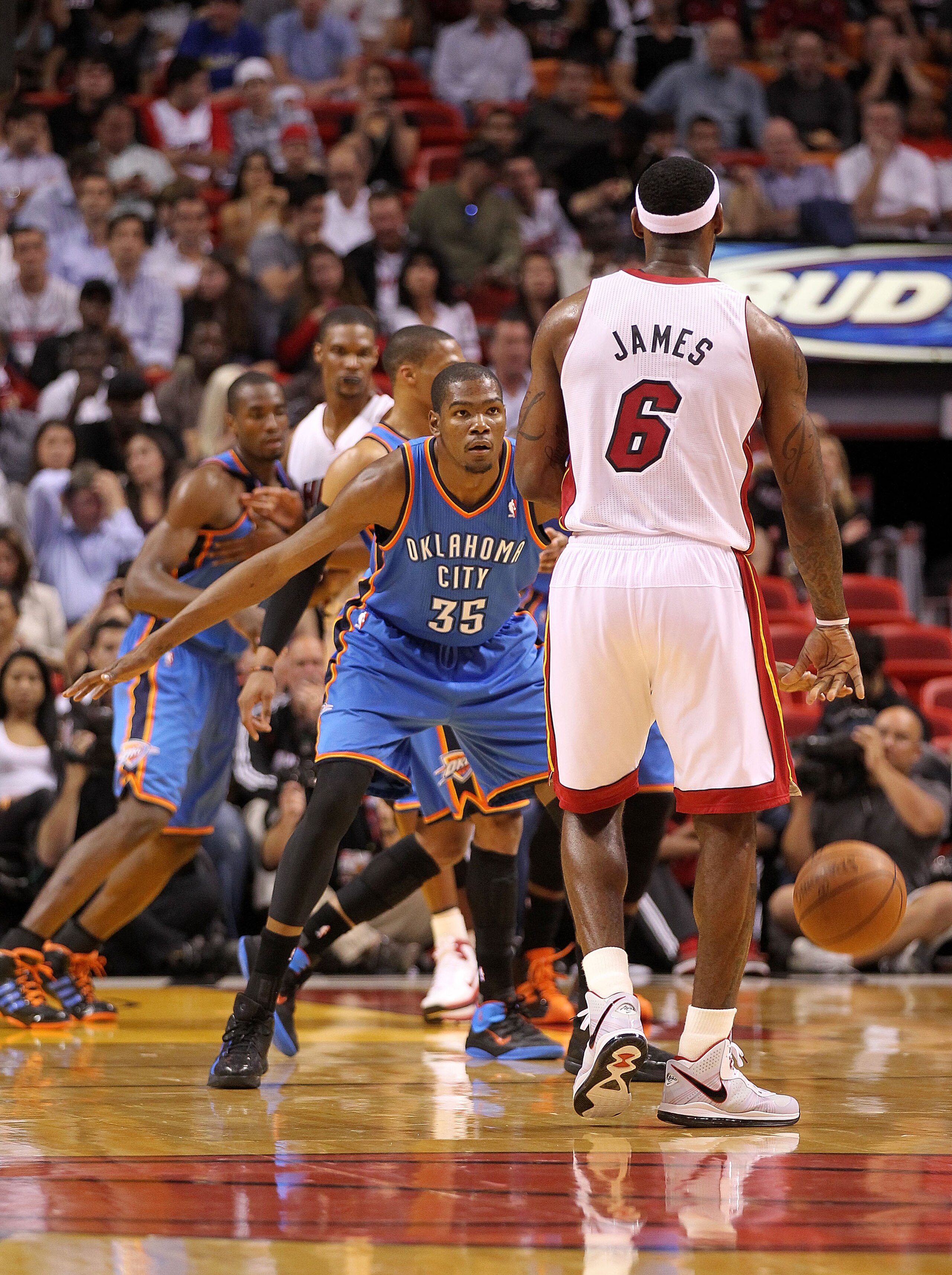 MIAMI, FL - MARCH 16: LeBron James #6 of the Miami Heat is guarded by Kevin Durant #35 of the Oklahoma City Thunder during a game at American Airlines Arena on March 16, 2011 in Miami, Florida. NOTE TO USER: User expressly acknowledges and agrees that, b MIAMI, FL - MARCH 16: LeBron James #6 of the Miami Heat is guarded by Kevin Durant #35 of the Oklahoma City Thunder during a game at American Airlines Arena on March 16, 2011 in Miami, Florida. NOTE TO USER: User expressly acknowledges and agrees that, b