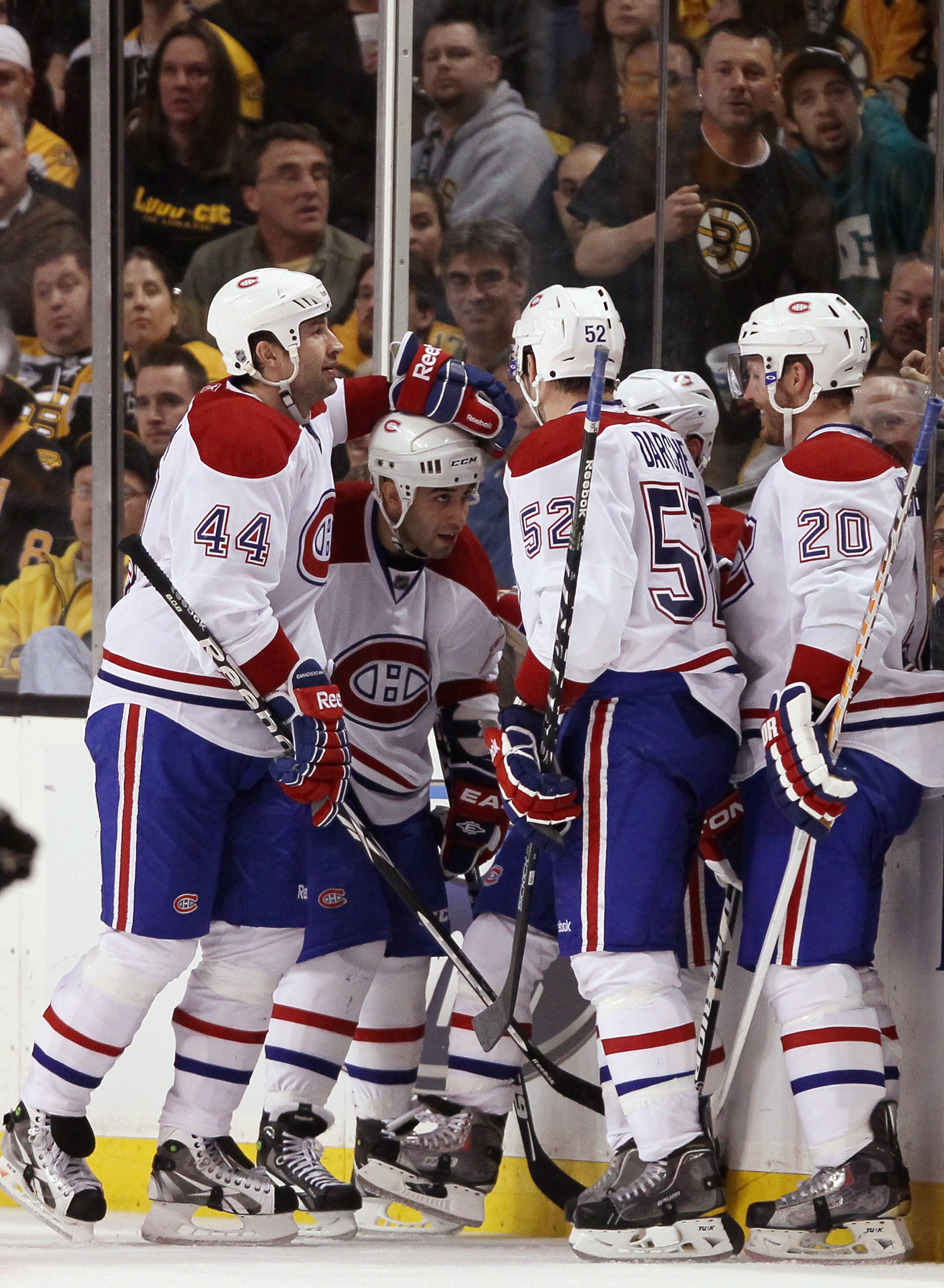 BOSTON, MA - APRIL 14:  Brian Gionta #21 of the Montreal Canadiens is congratulated by teammates Roman Hamrlik #44,Scott Gomez #11,Mathieu Darche #52 and James Wisniewski #20 after Gionta scored the second goal of the game in Game One of the Eastern Confe