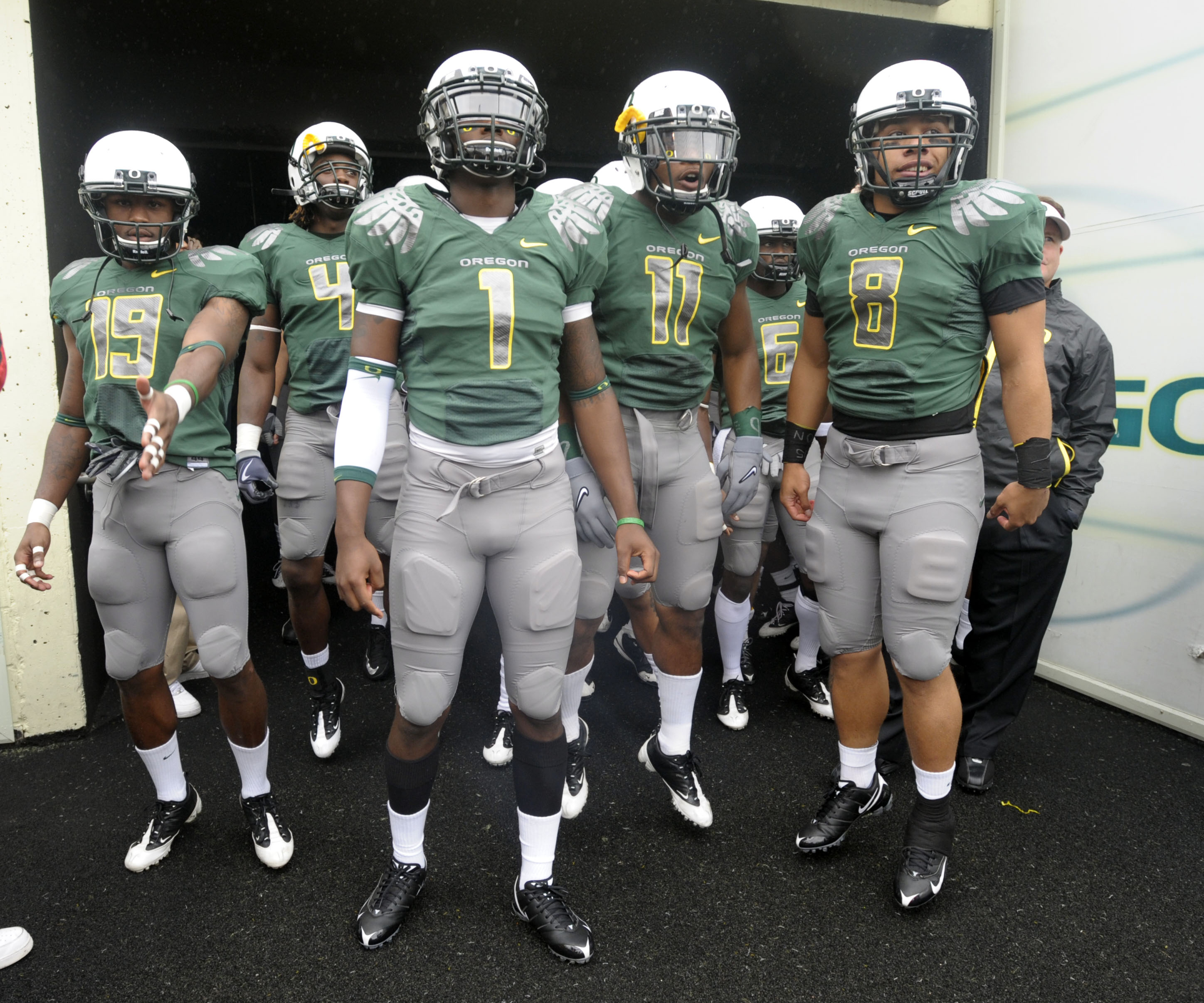 EUGENE, OR - SEPTEMBER 19: Jamere Holland #19, Darron Thomas #1, Eddie Pleasant #11 and Jeremiah Masoli #8 of the Oregon Ducks wait in the tunnel to be introduced before the start of the game against the Utah Utes at Autzen Stadium on September 19, 2009 i