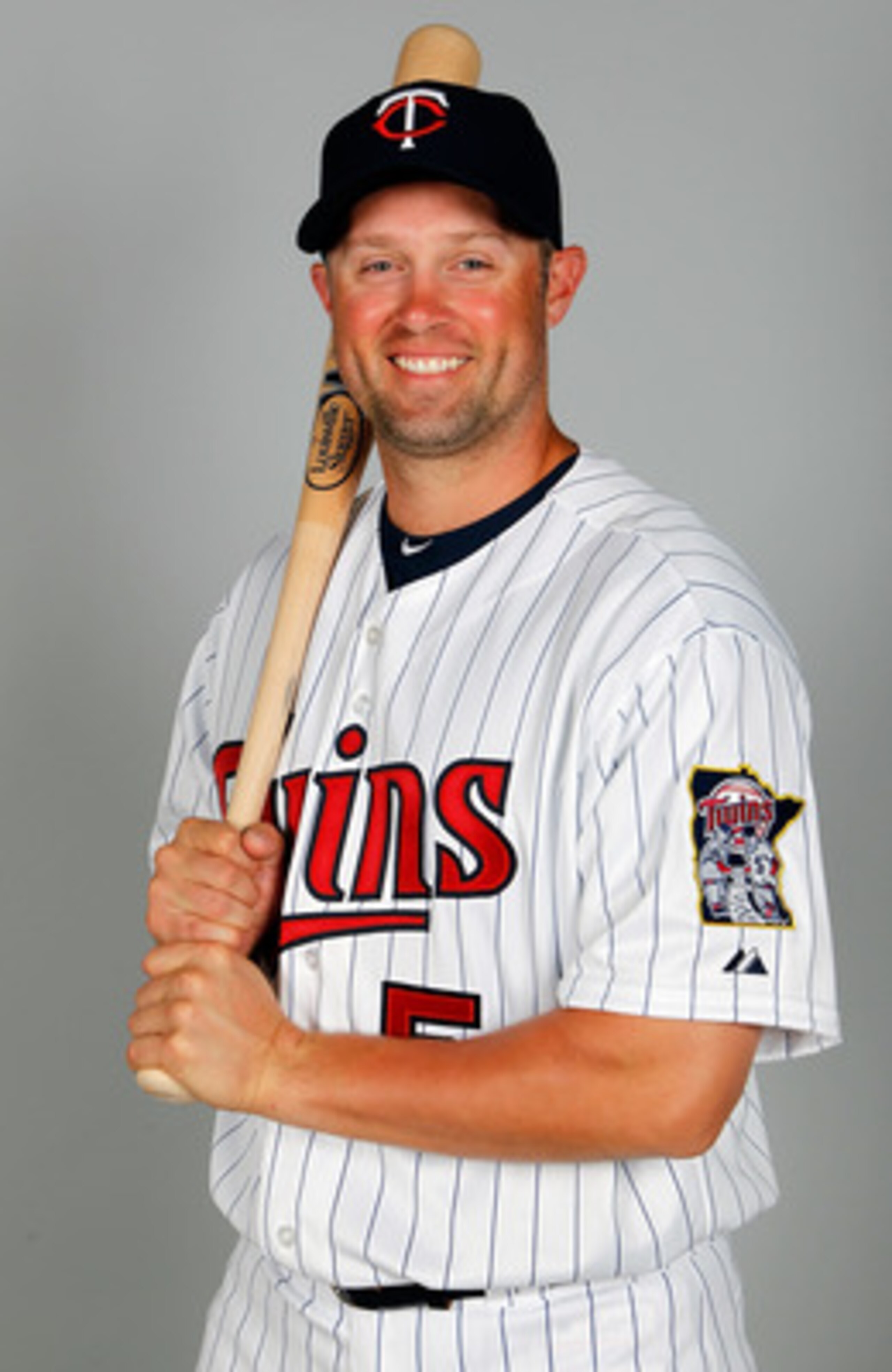 FORT MYERS, FL - FEBRUARY 25:  Outfielder Michael Cuddyer #5 of the Minnesota Twins poses for a photo during photo day at Hammond Stadium on February 25, 2011 in Fort Myers, Florida.  (Photo by J. Meric/Getty Images)