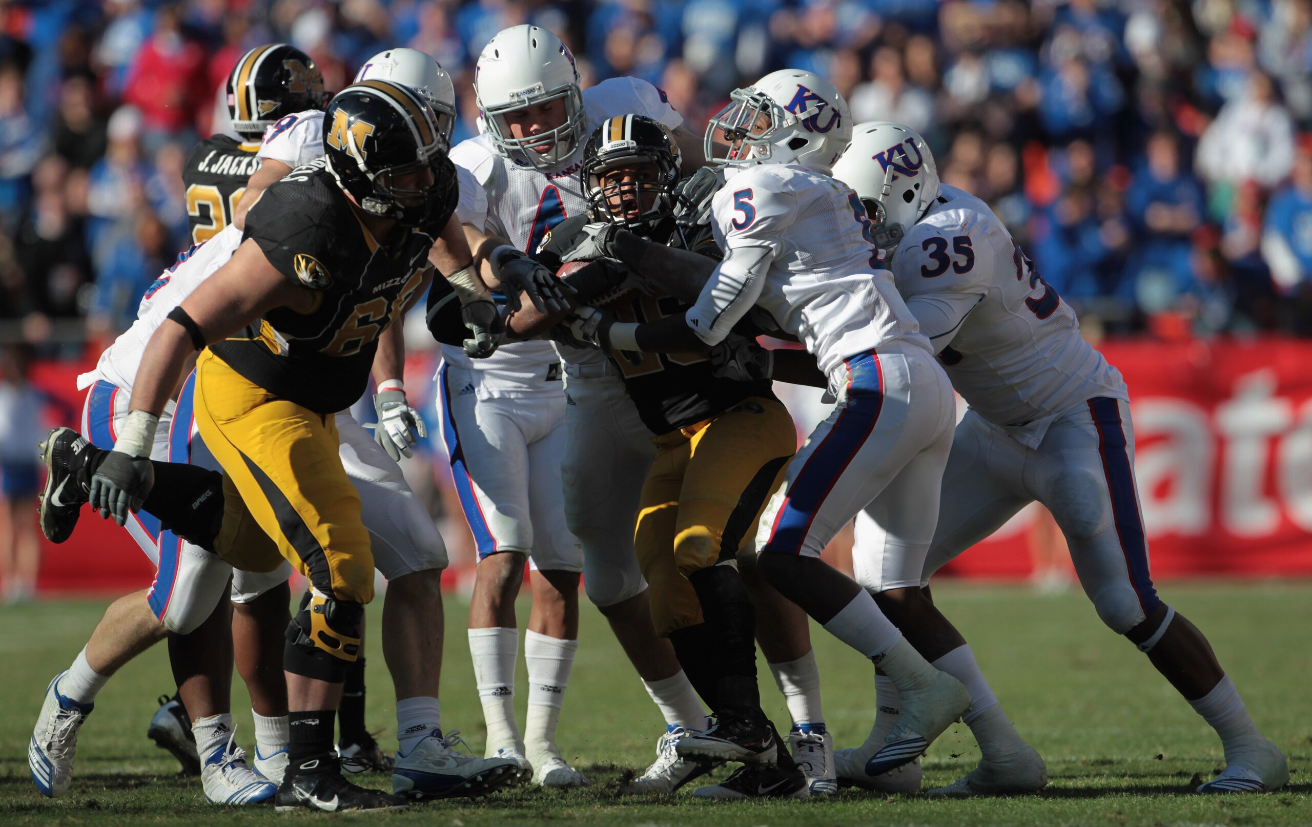 KANSAS CITY, MO - NOVEMBER 27:  De'Vion Moore #26 of the Missouri Tigers carries the ball during the game against the Kansas Jayhawks on November 27, 2010 at Arrowhead Stadium in Kansas City, Missouri.  (Photo by Jamie Squire/Getty Images)