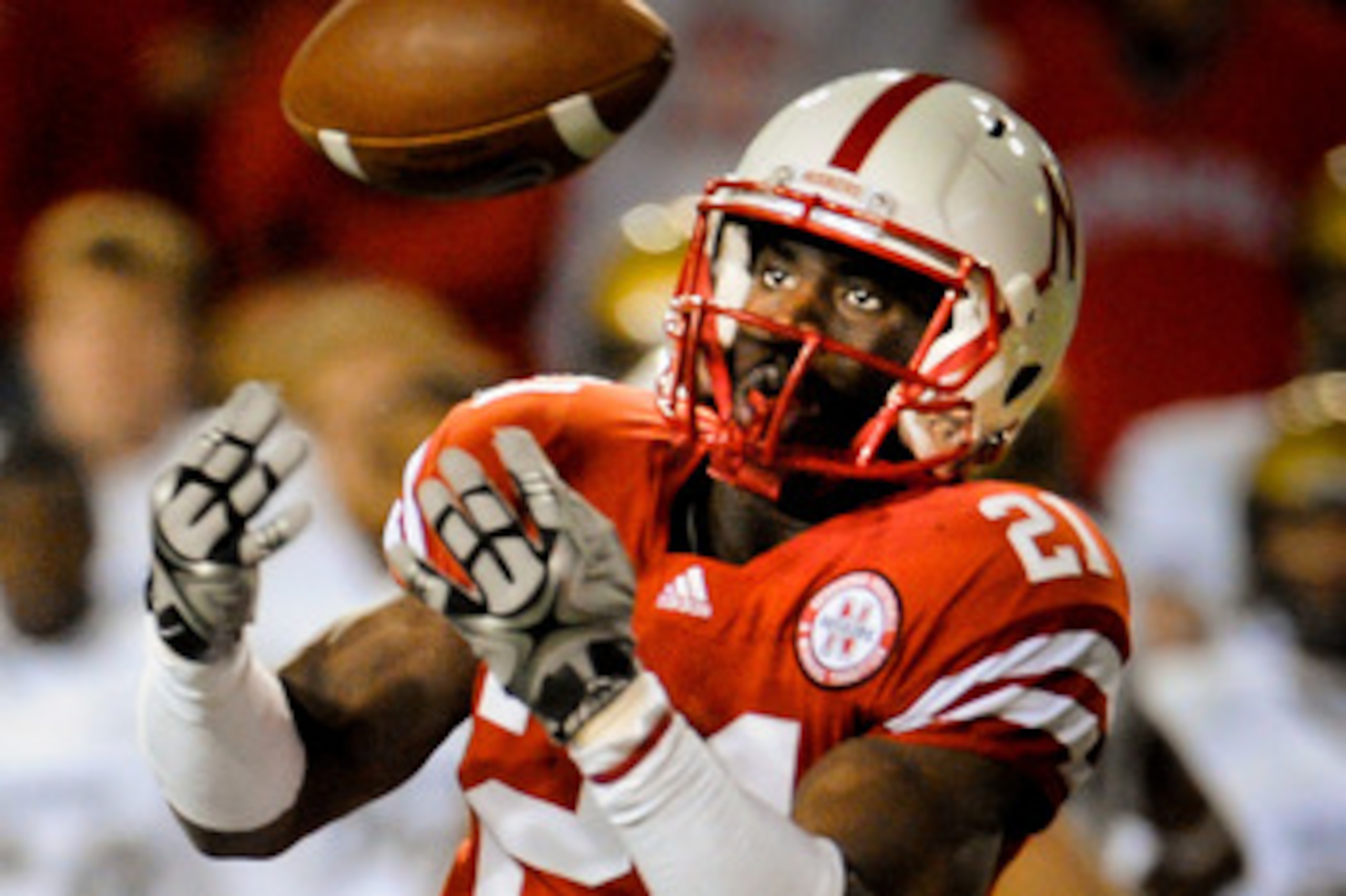 LINCOLN, NE - NOVEMBER 26: Prince Amukamara #21 of the Nebraska Cornhuskers misses a chance at an interception from Scotty McKnight #21 of the Colorado Buffaloes during the second half of their game at Memorial Stadium on November 26, 2010 in Lincoln, Neb LINCOLN, NE - NOVEMBER 26: Prince Amukamara #21 of the Nebraska Cornhuskers misses a chance at an interception from Scotty McKnight #21 of the Colorado Buffaloes during the second half of their game at Memorial Stadium on November 26, 2010 in Lincoln, Neb