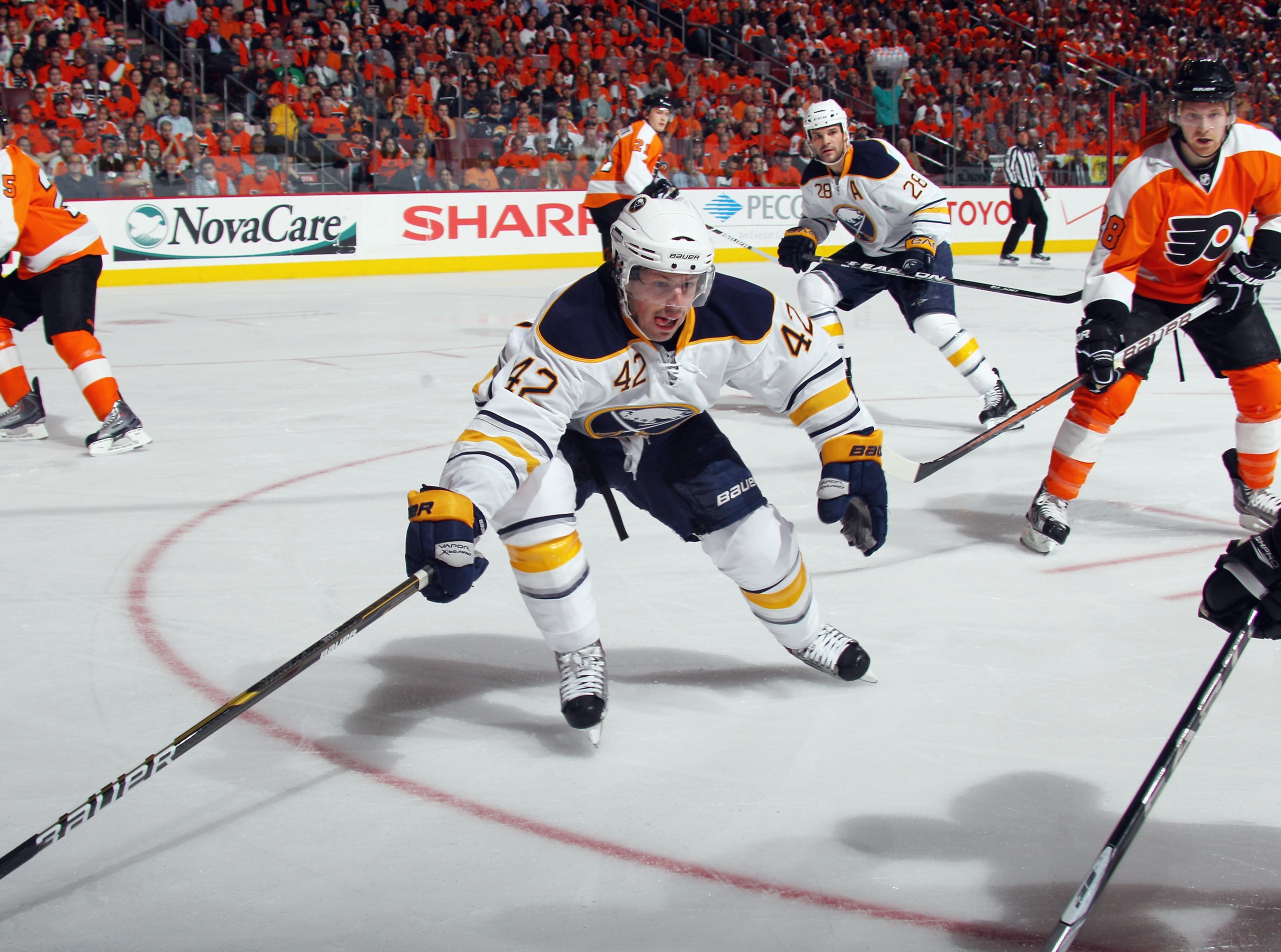 PHILADELPHIA, PA - APRIL 14: Nathan Gerbe #42 of the Buffalo Sabres forechecks against the Philadelphia Flyers in Game One of the Eastern Conference Quarterfinals during the 2011 NHL Stanley Cup Playoffs at Wells Fargo Center on April 14, 2011 in Philadel