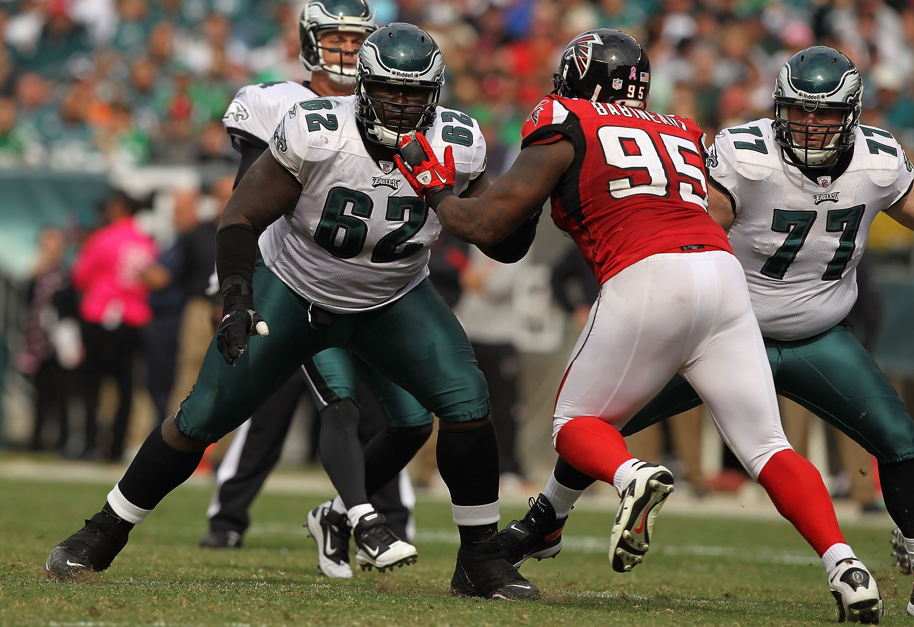 PHILADELPHIA - OCTOBER 17: Max Jean Gilles #62 of the Philadelphia Eagles in action against Jonathan Babineaux #95 of the Atlanta Falcons during their game at Lincoln Financial Field on October 17, 2010 in Philadelphia, Pennsylvania.  (Photo by Al Bello/G