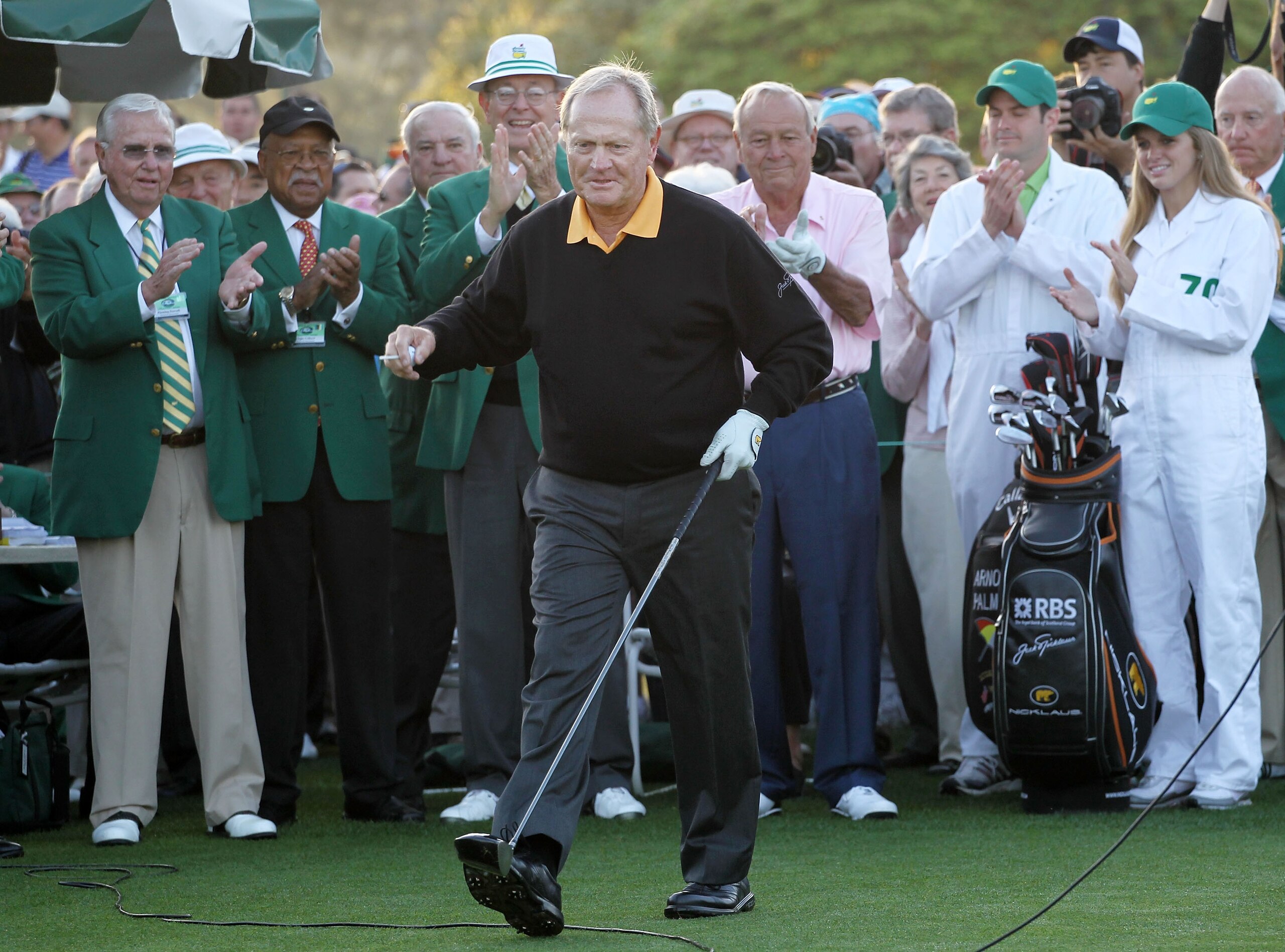 AUGUSTA, GA - APRIL 08:  Honorary starter Jack Nicklaus reacts after hitting his tee shot on the first hole as Arnold Palmer looks on during the first round of the 2010 Masters Tournament at Augusta National Golf Club on April 8, 2010 in Augusta, Georgia.