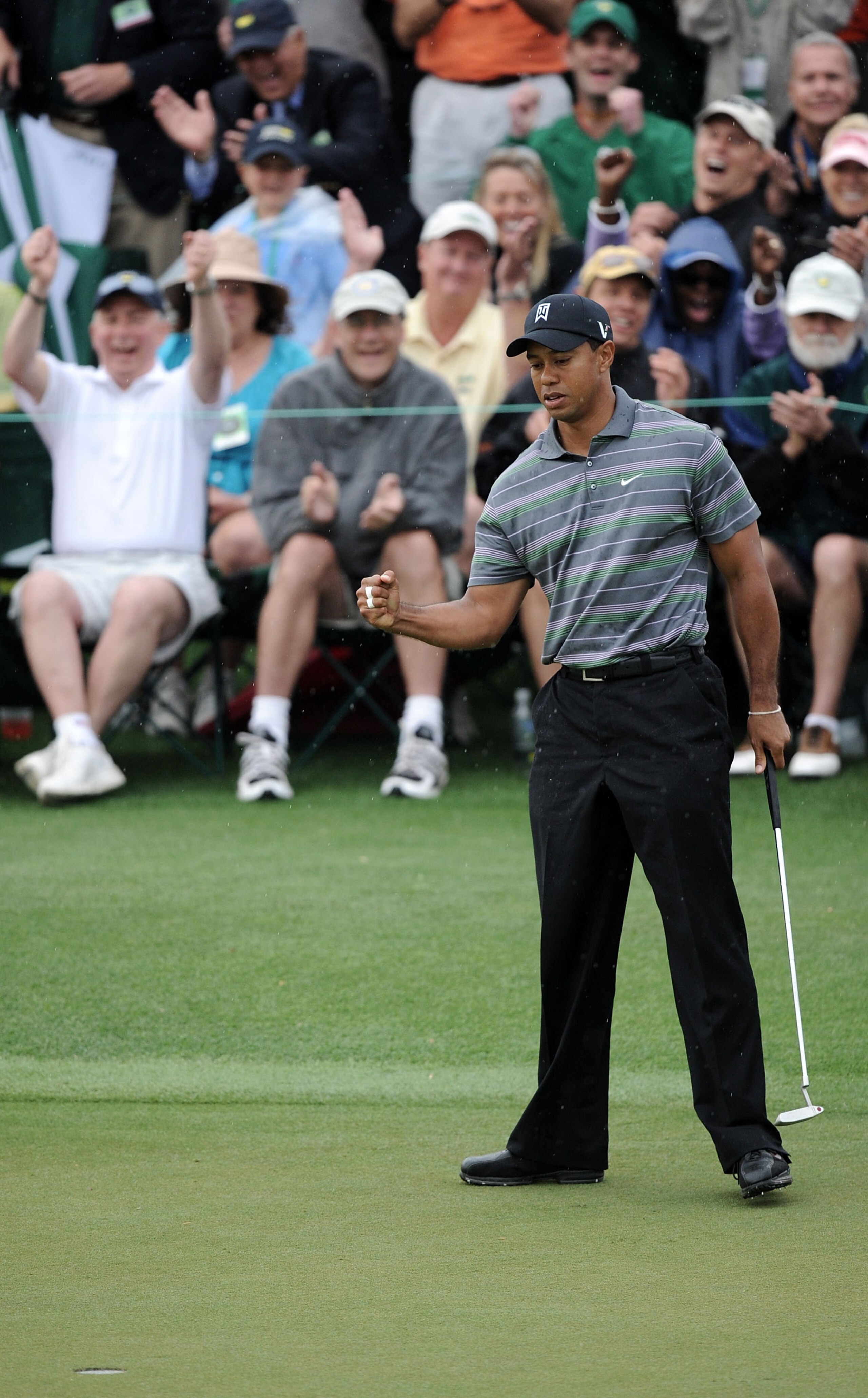 AUGUSTA, GA - APRIL 08:  Tiger Woods celebrates making birdie on the ninth hole during the first round of the 2010 Masters Tournament at Augusta National Golf Club on April 8, 2010 in Augusta, Georgia.  (Photo by Harry How/Getty Images)