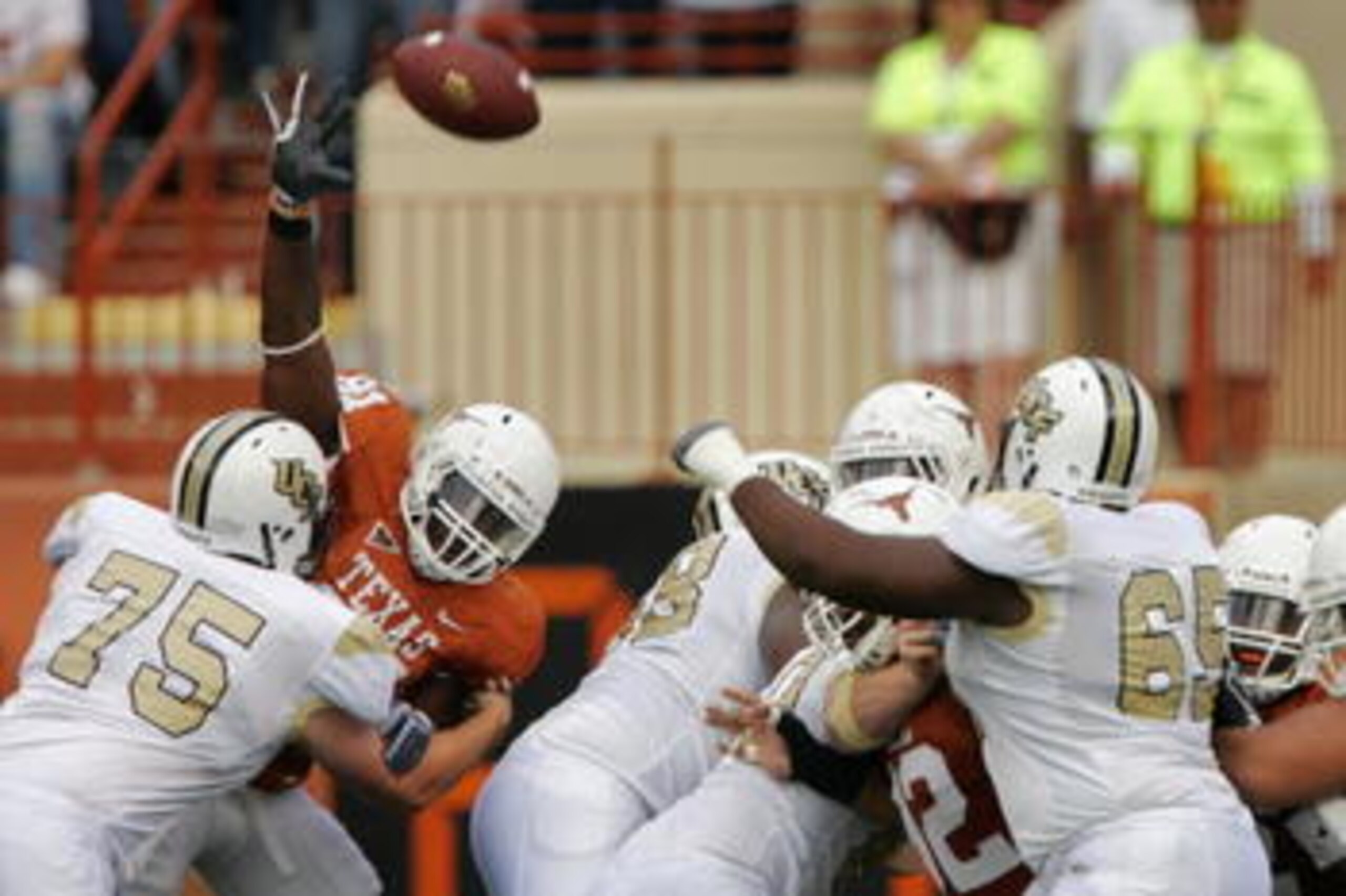 AUSTIN, TX - NOVEMBER 07: Quarterback Rob Calabrese #4 of the UCF Knights prepares to run a play against the Texas Longhorns on November 7, 2009 at Darrell K Royal - Texas Memorial Stadium in Austin, Texas. Texas won 35-3. (Photo by Brian Bahr/Getty Im AUSTIN, TX - NOVEMBER 07: Quarterback Rob Calabrese #4 of the UCF Knights prepares to run a play against the Texas Longhorns on November 7, 2009 at Darrell K Royal - Texas Memorial Stadium in Austin, Texas. Texas won 35-3. (Photo by Brian Bahr/Getty Im